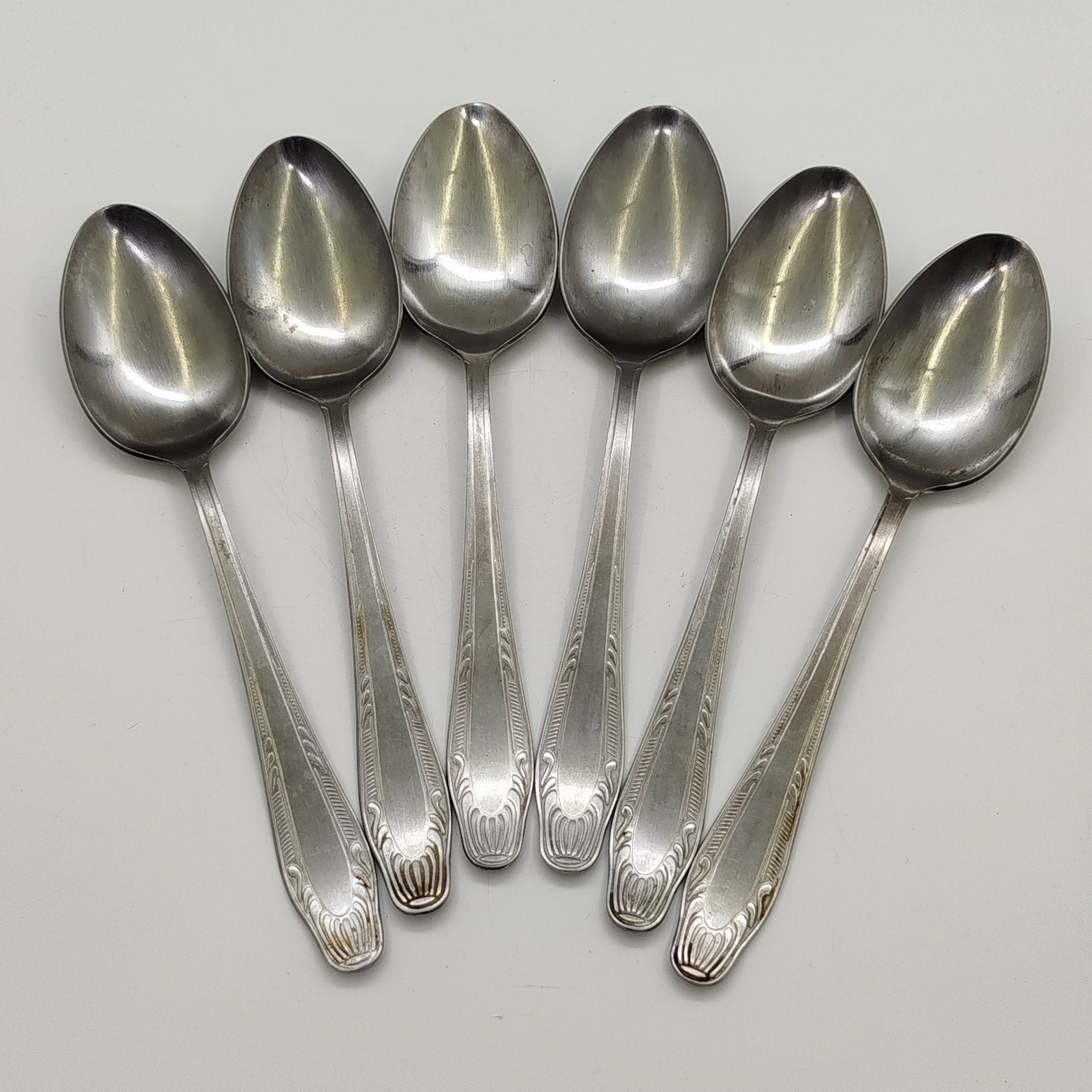 Набор из 6-ти столовых ложек, украшенных растительным декором, Нытвенский металлургический завод, нержавеющая сталь