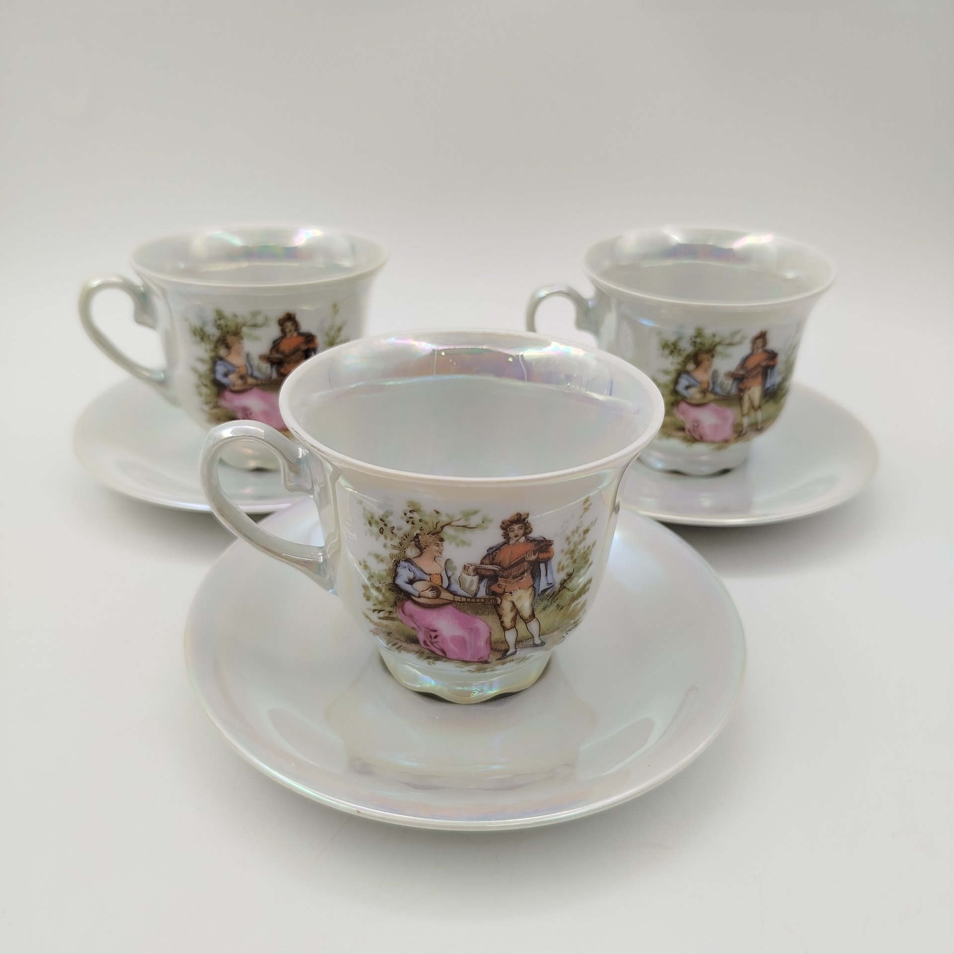 Сервиз кофейный "Галантная сцена" на 6 персон (15 предметов), фарфор, деколь, люстр, золочение, Западная Европа, 1970-1990 гг.