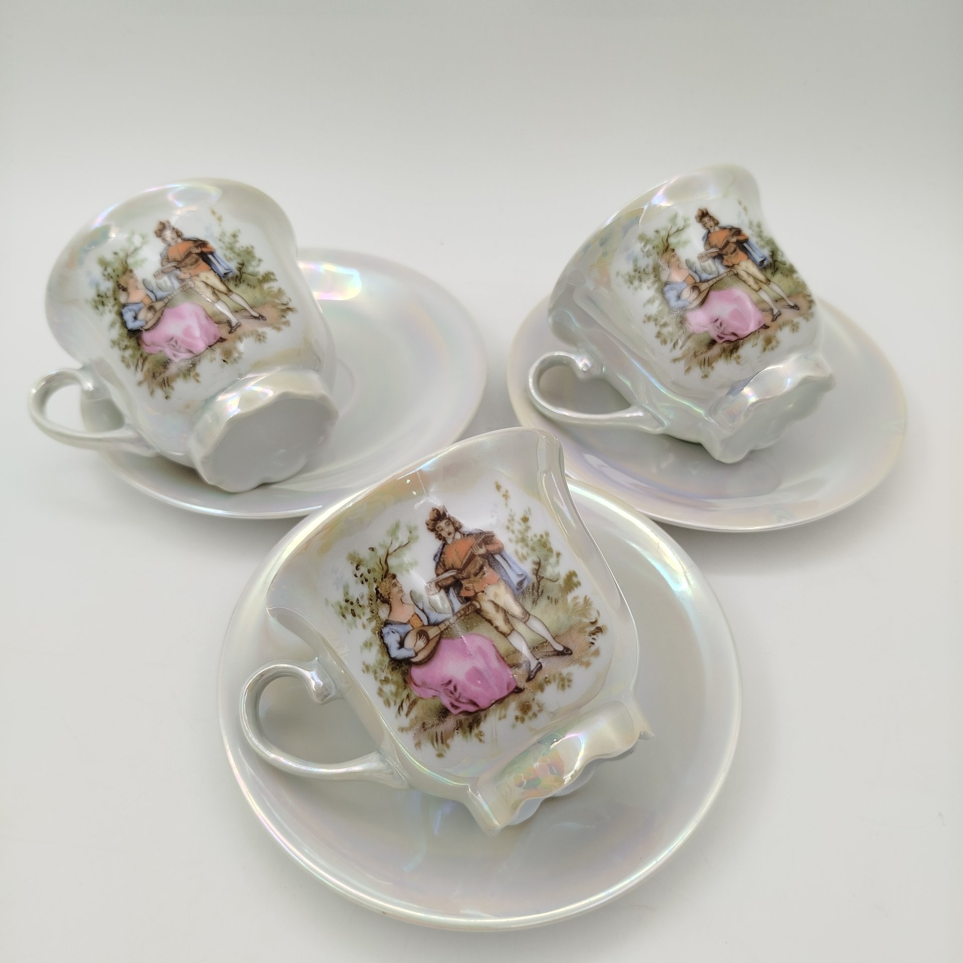 Сервиз кофейный "Галантная сцена" на 6 персон (15 предметов), фарфор, деколь, люстр, золочение, Западная Европа, 1970-1990 гг.