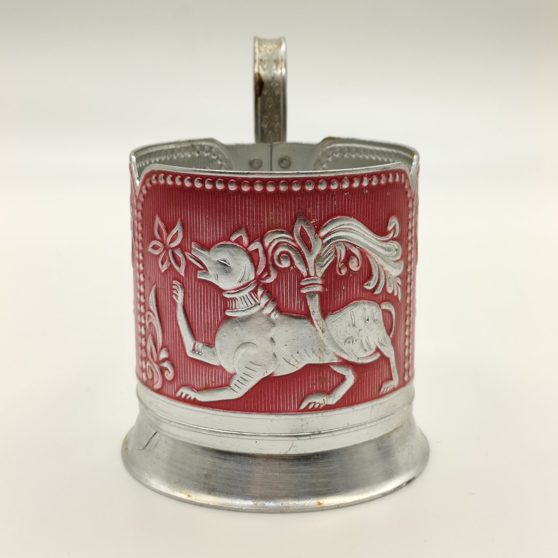 Подстаканник "Сказочные животные" на красном фоне, алюминий, крашение, чеканка, Завод художественной гравюры на металле, СССР, 1973-1991 гг.