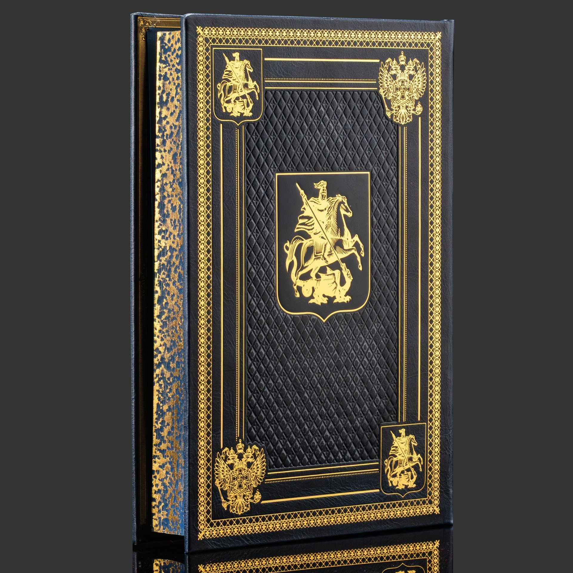 Подарочный набор с книгой "Кодекс чести русского офицера" и иконой "Георгий Победоносец" в лакированной шкатулке, бумага, кожаный переплет, тиснение, золочение, обрез с принтом; дерево, металл, серебрение, серебро; в подарочном лакированном футляре с бархатным ложеменом, и подарочном картонном коробе, Российская Федерация, 2025 г.