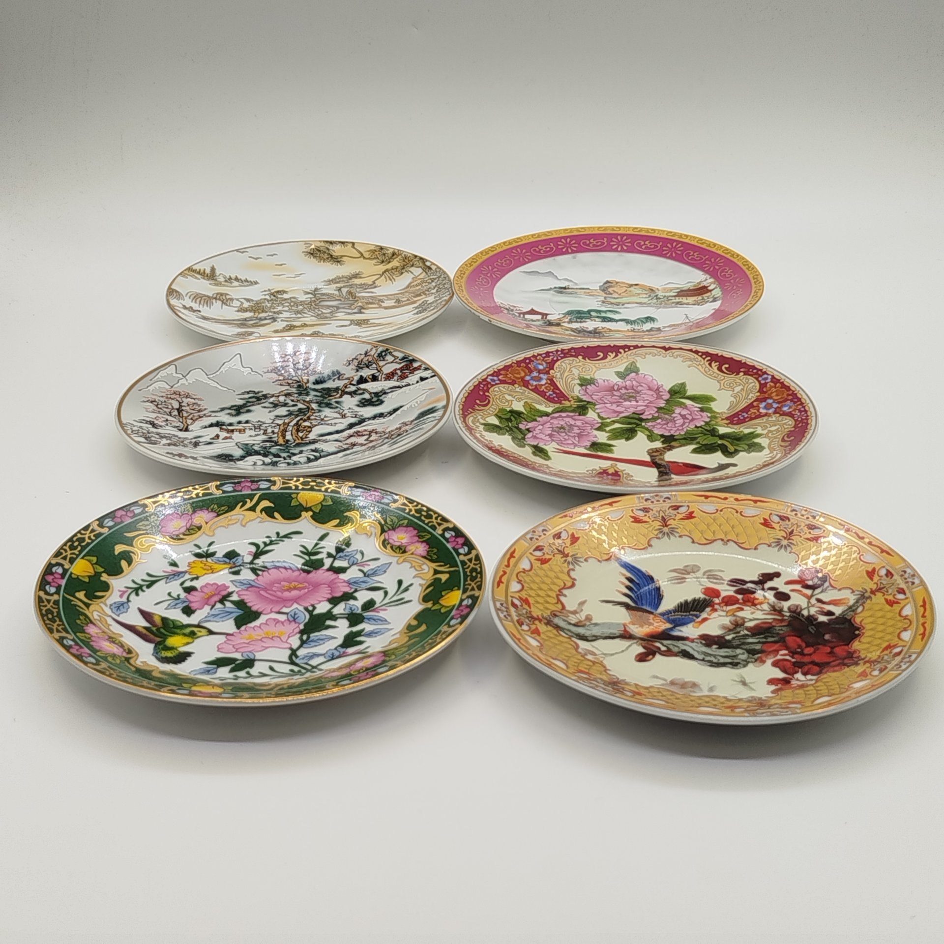 Набор из 6-ти блюдец, украшенных пейзажным и орнитологическим декором (в подборе)