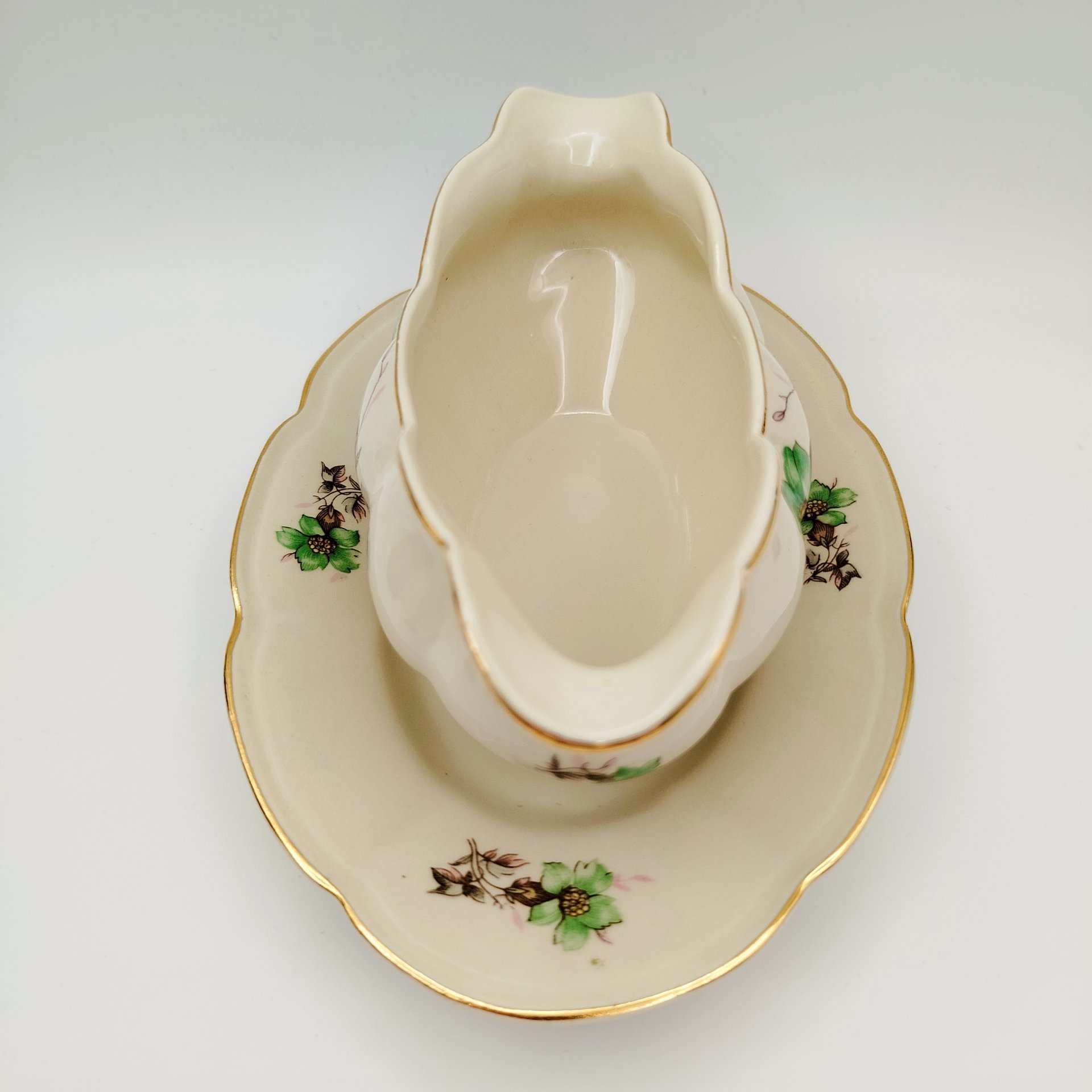 Соусник на подставке, украшенный цветочным декором