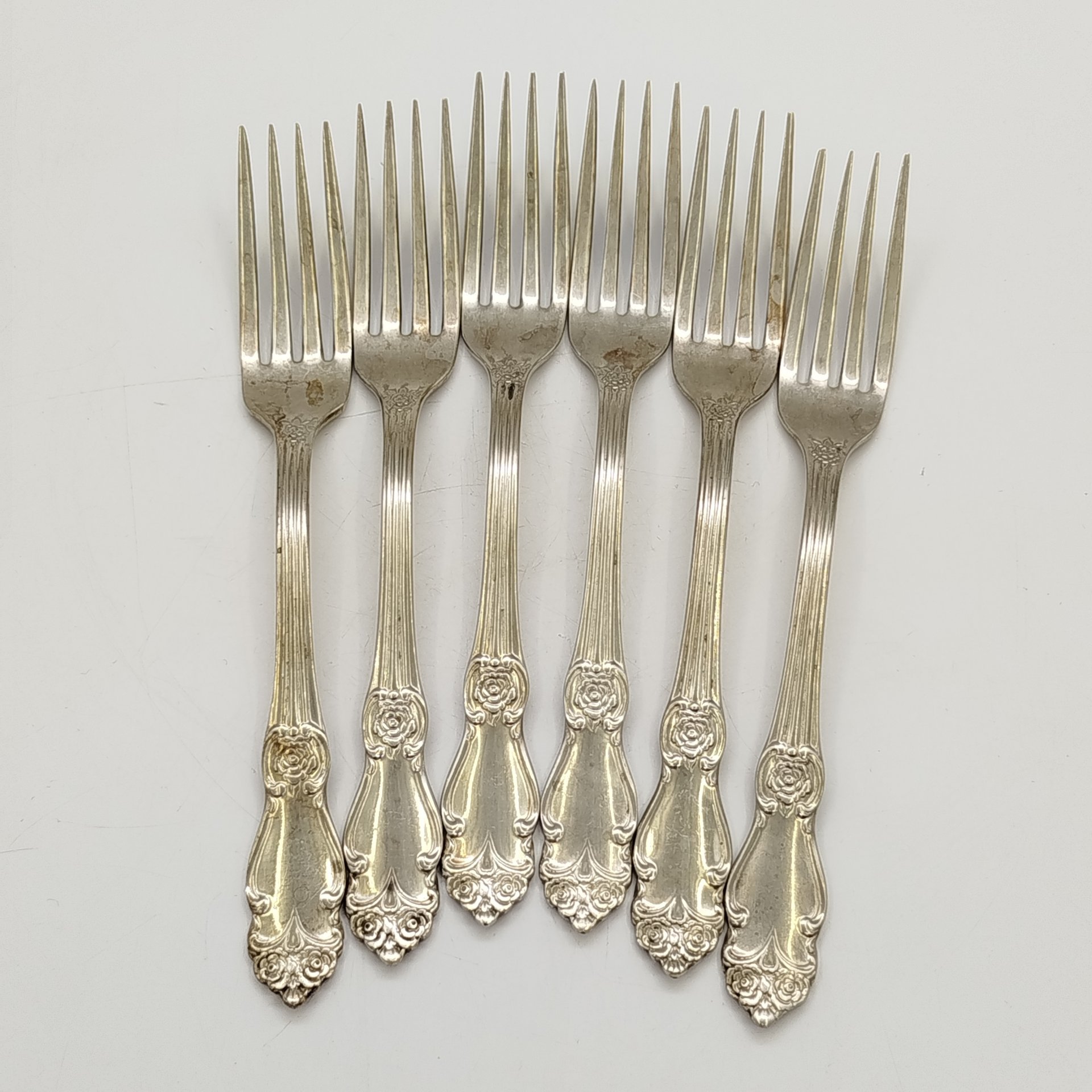 Набор из шести десертных вилок "Серебряная роза", мНЦ (медь-никель-цинк), Кольчугинский завод цветных металлов, СССР, 1970-1990 гг.