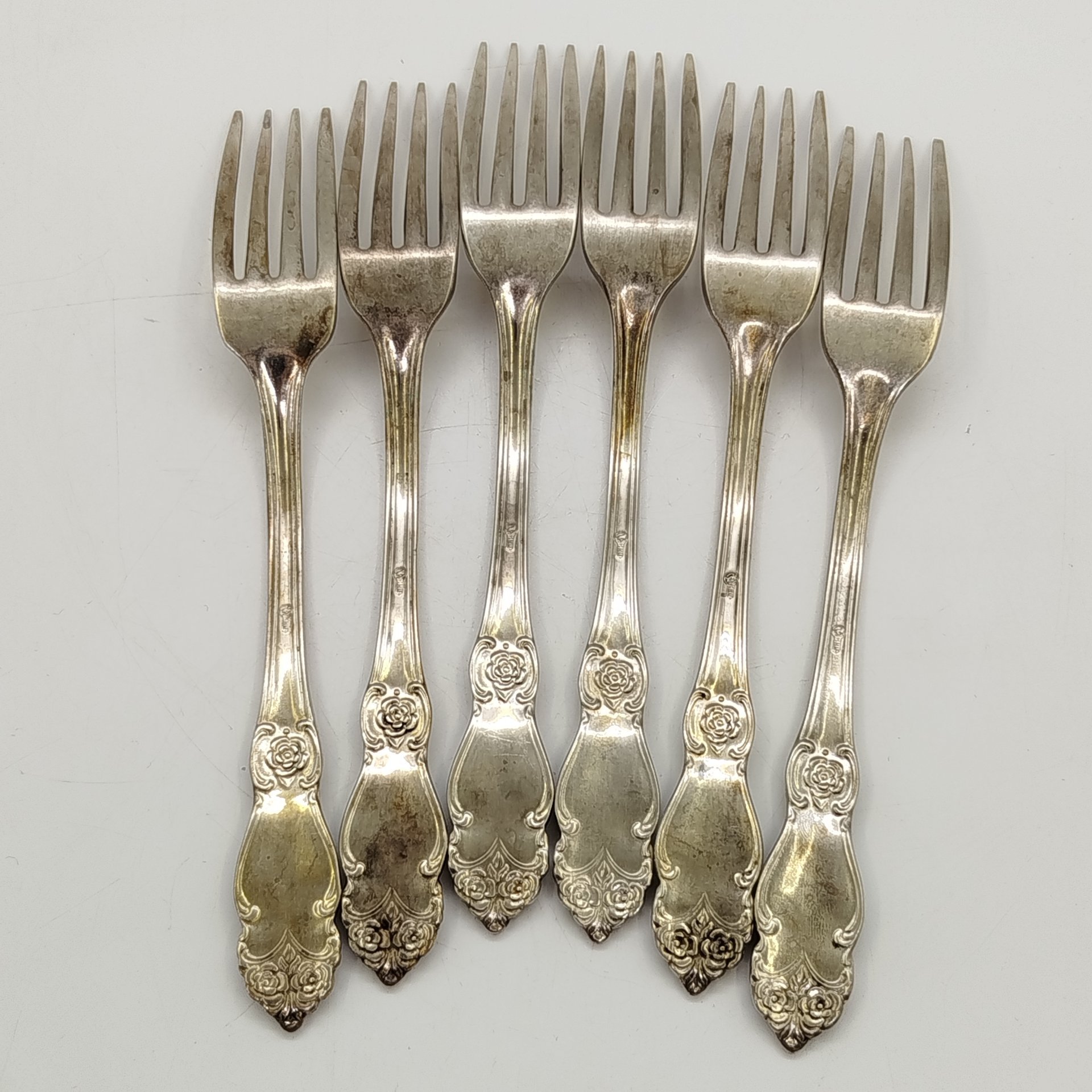 Набор из шести десертных вилок "Серебряная роза", мНЦ (медь-никель-цинк), Кольчугинский завод цветных металлов, СССР, 1970-1990 гг.