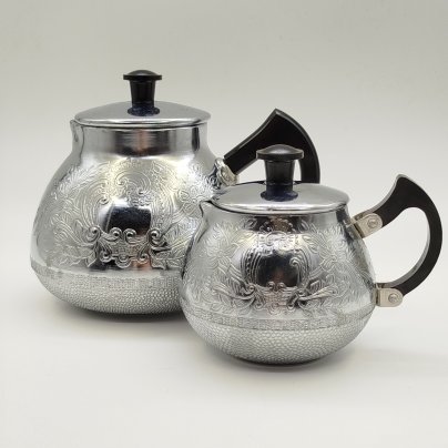 Набор из кофейника и молочника с рельефным цветочным декором, Калининградский машиностроительный завод