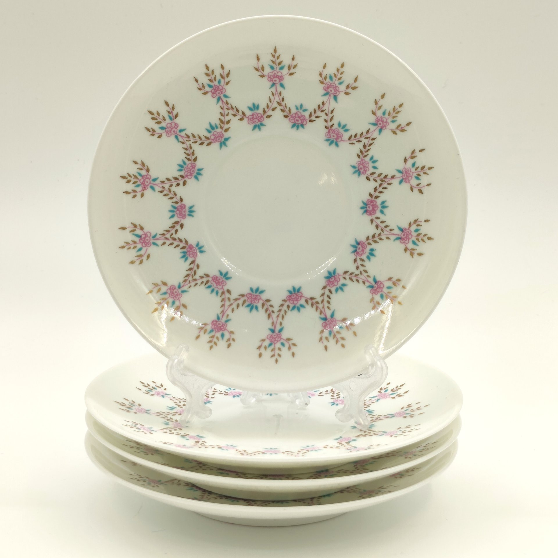 Набор из 4-х блюдец с декором в виде гирлянд, фарфор, деколь, Ленинградский фарфоровый завод (ЛФЗ), СССР, 1970-1991 гг.