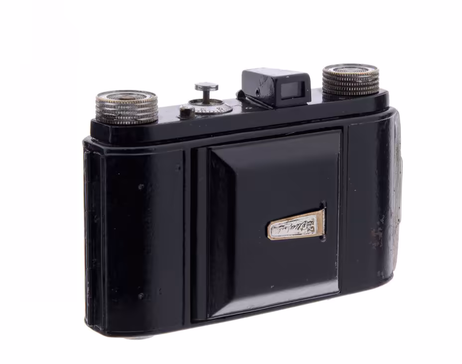 Складной шкальный фотоаппарат "Welta Weltix" с объективом Steinheil Munchen Cassar 1:2.9 f=5 cm, металл, компания Welta, Германия, 1935-1960 гг., Welta