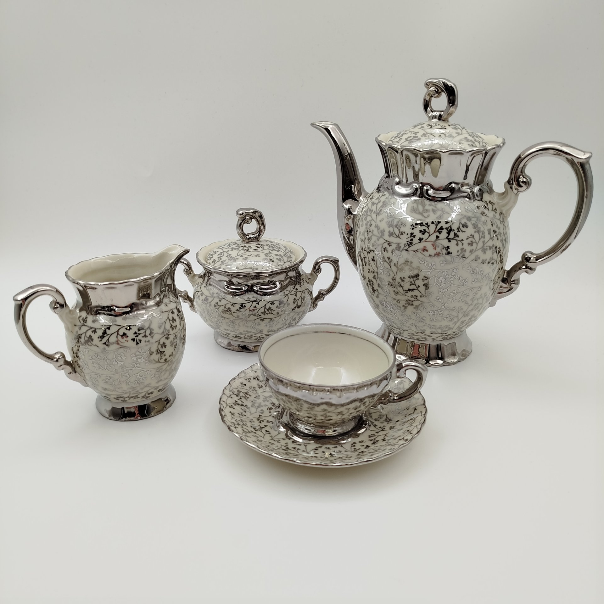 Сервиз кофейный на одну персону (5 предметов), украшенный растительным декором, фарфор, серебрение, Mitterteich Bavaria, Бавария, 1931-1945 гг.