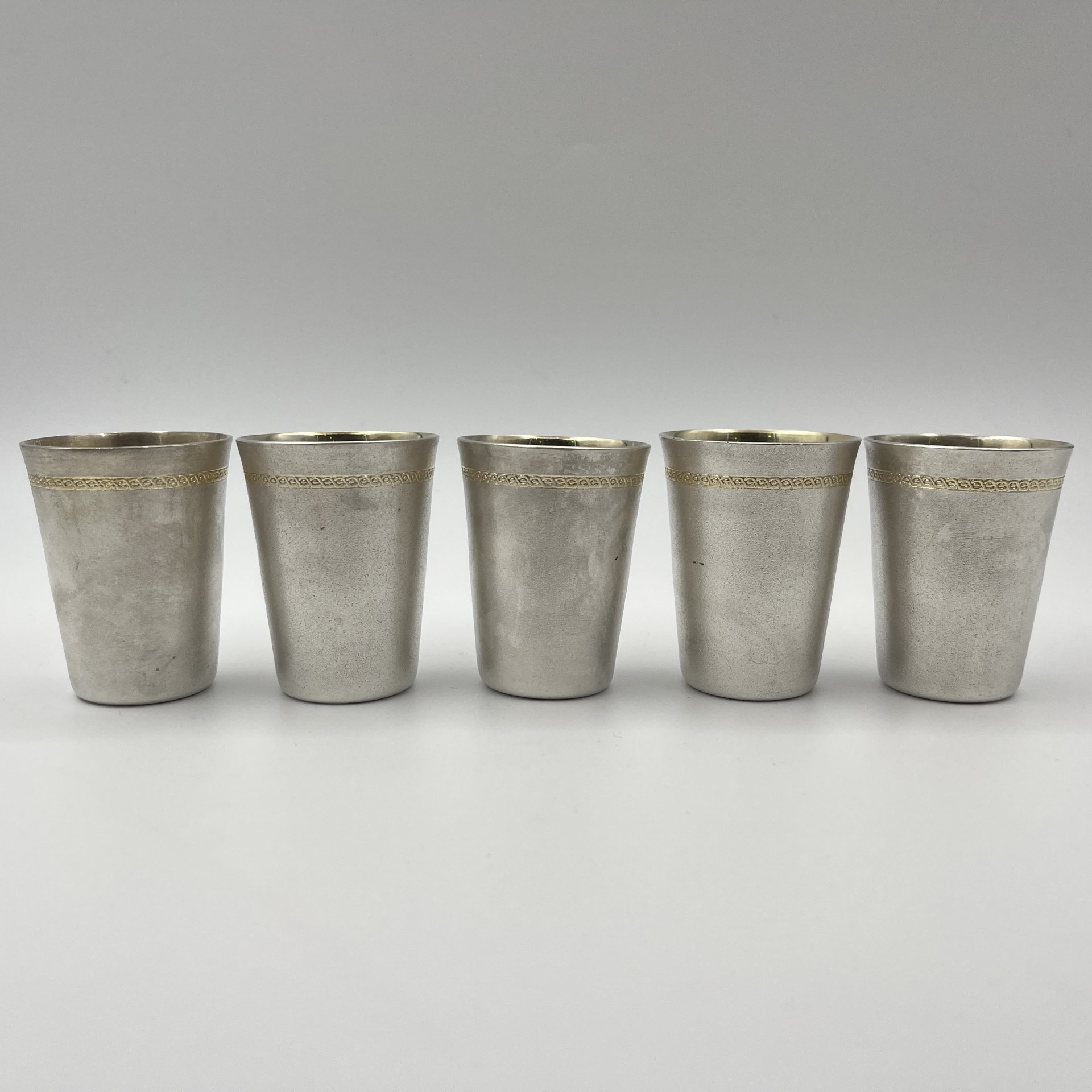 Набор из 5 стопок с геометрическим декором, мельхиор (медь-никель), СССР, 1970-1990 гг.