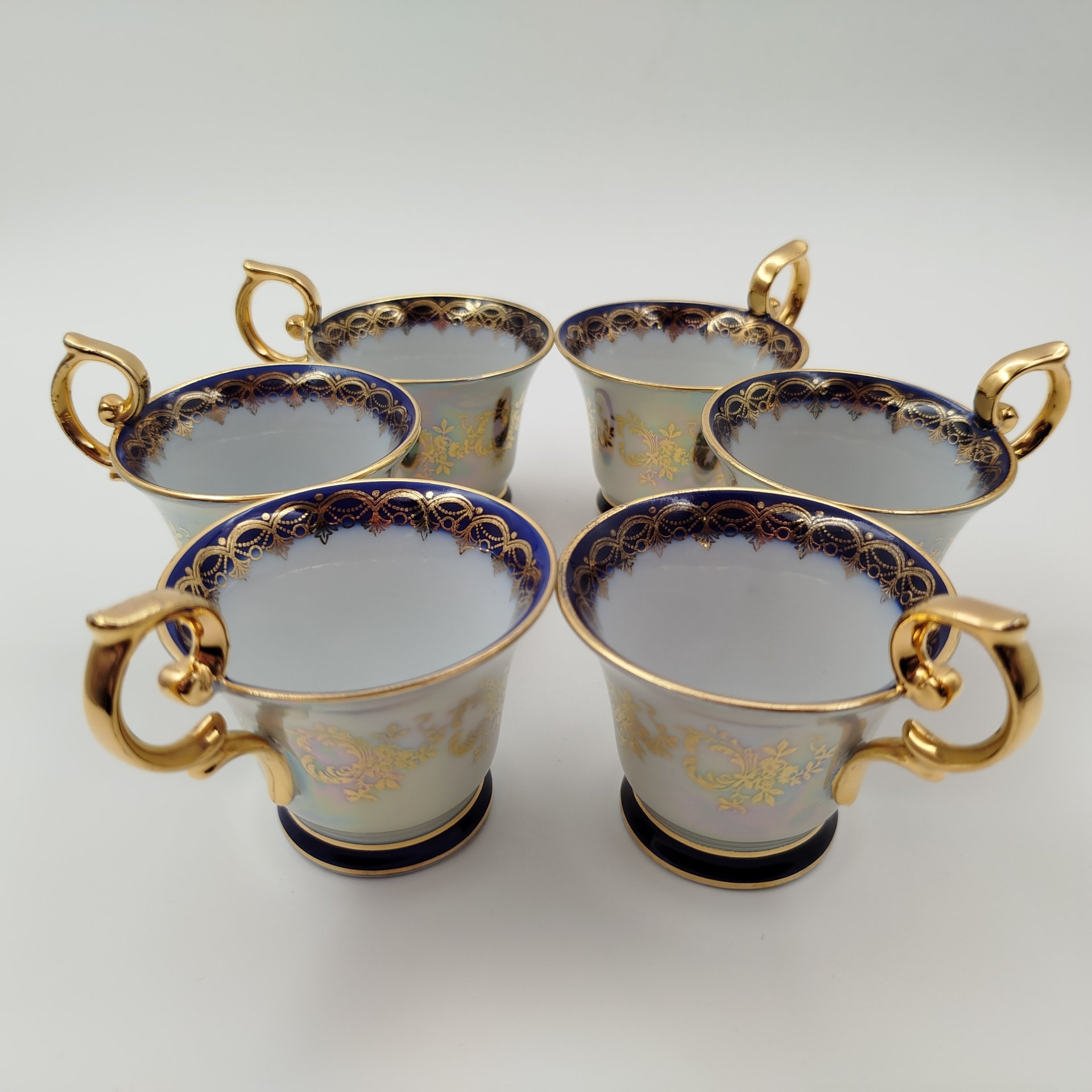 Набор кофейных пар с растительным декором золотого цвета и кобальтовым кантом на 6 персон, фарфор, люстр, золочение, Martinroda Friedrich Eger & Co. (PM), Германия, 1960-1980 гг.