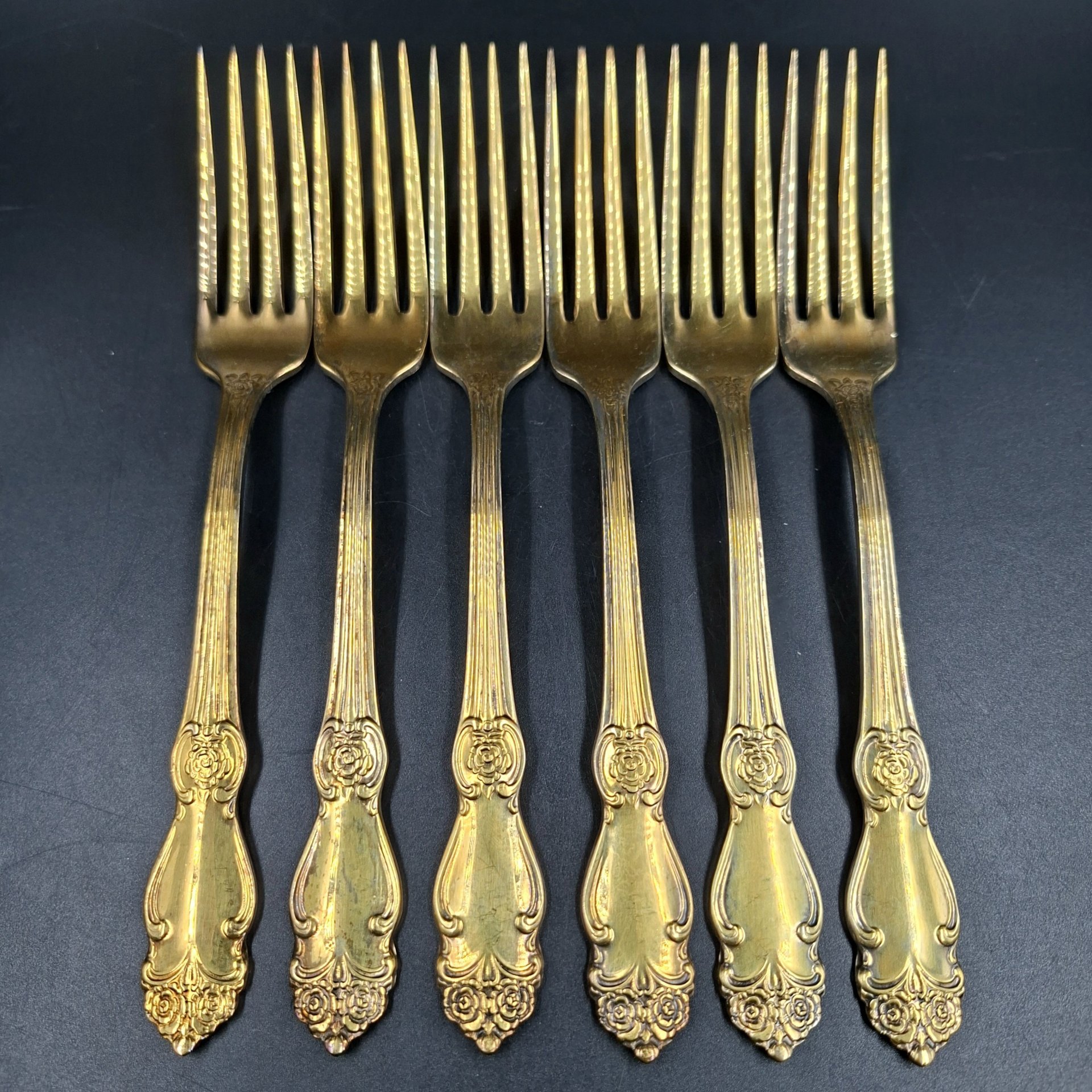 Набор из шести обеденных вилок "Серебряная роза", мНЦ (медь-никель-цинк), золочение, Кольчугинский завод цветных металлов, СССР, 1970-1990 гг.