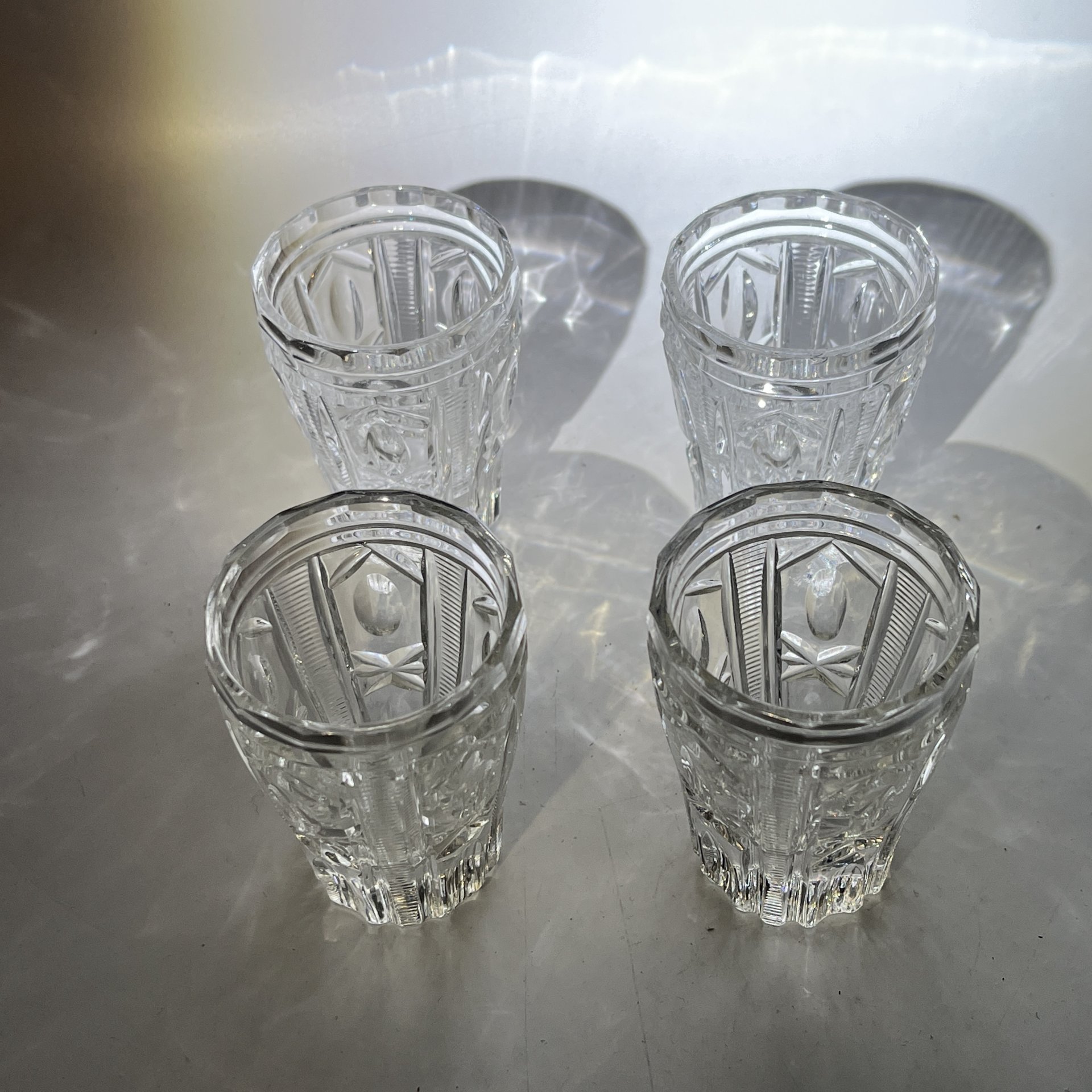 Набор из 4 стопок с геометрическим декором, стекло, пресс, СССР, 1970-1990 гг.