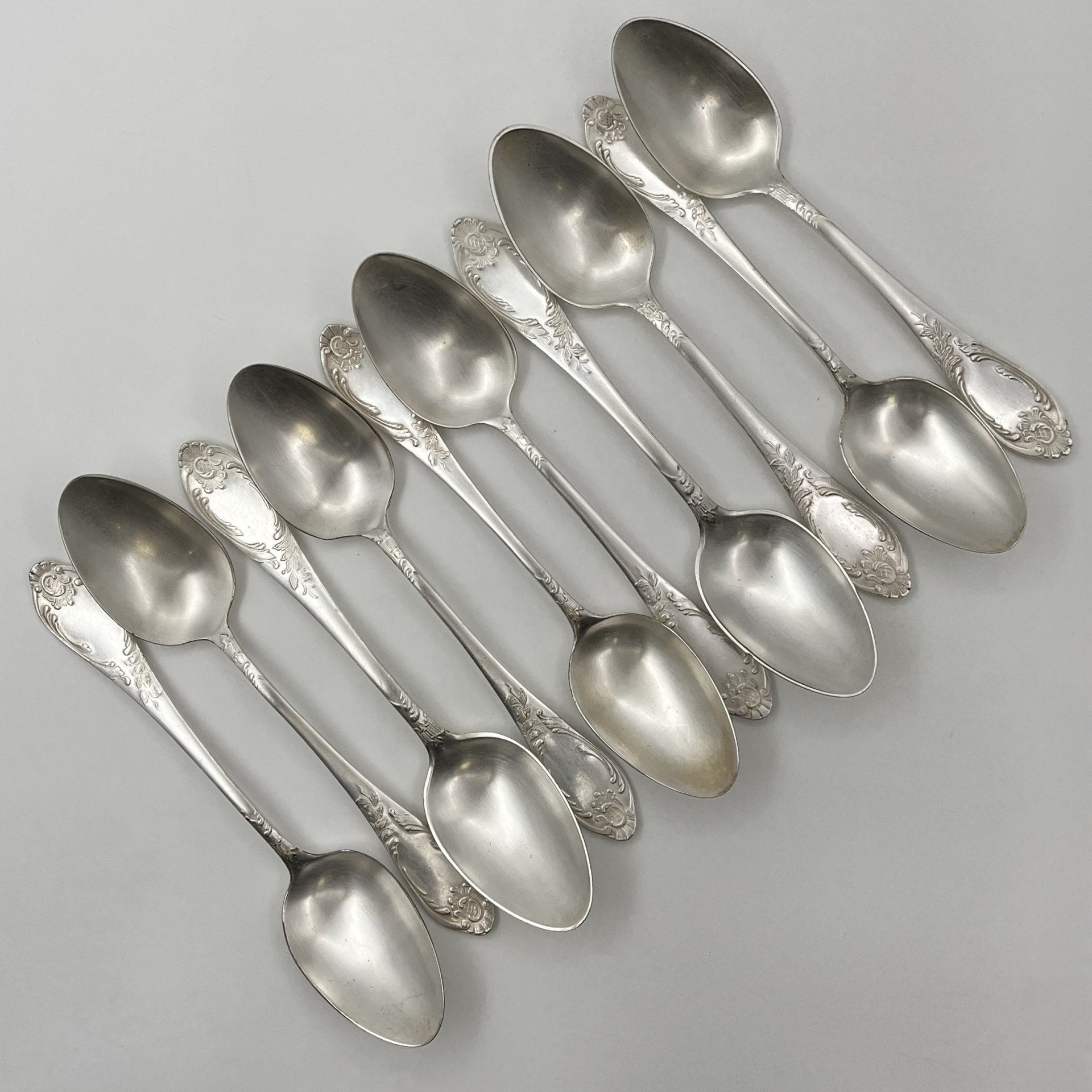 Набор из десяти столовых ложек с растительным декором, мНЦ (медь-никель-цинк), Вольнянский завод столовых приборов им. Шевченко (ЗiШ, ЗиШ), СССР, 1960-1990 гг.