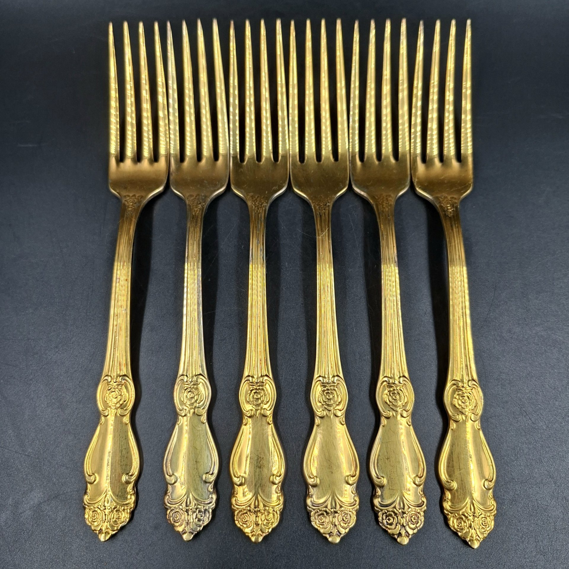 Набор из шести обеденных вилок "Серебряная роза", мНЦ (медь-никель-цинк), золочение, Кольчугинский завод цветных металлов, СССР, 1970-1990 гг.