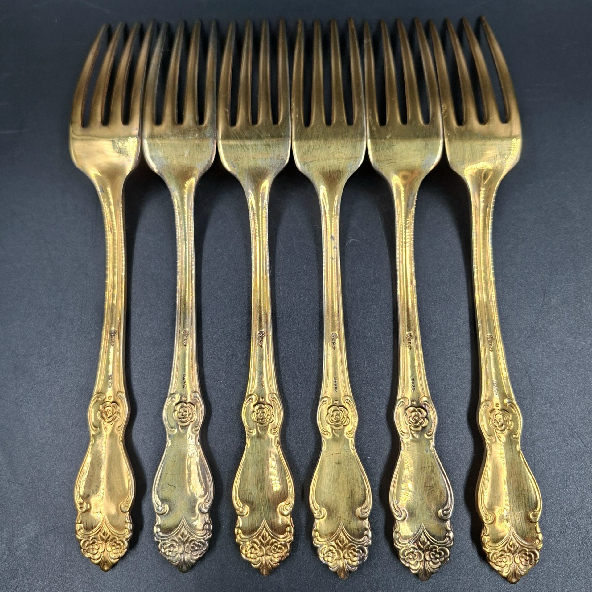 Набор из шести обеденных вилок "Серебряная роза", мНЦ (медь-никель-цинк), золочение, Кольчугинский завод цветных металлов, СССР, 1970-1990 гг.