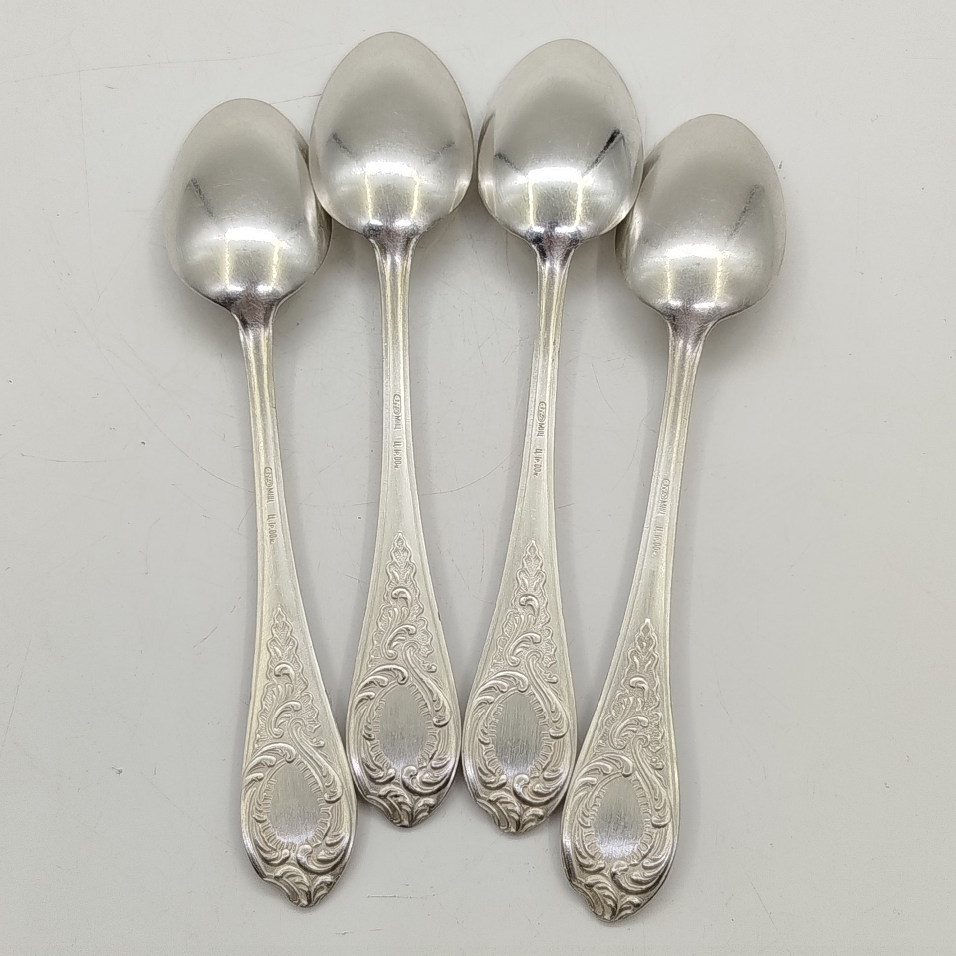 Набор из 4-х ложек с растительным декором, мНЦ (медь-никель-цинк), Киевский завод столовых приборов и посуды им. Дзержинского (ЗiД, ЗиД), СССР, 1962-1972 гг.