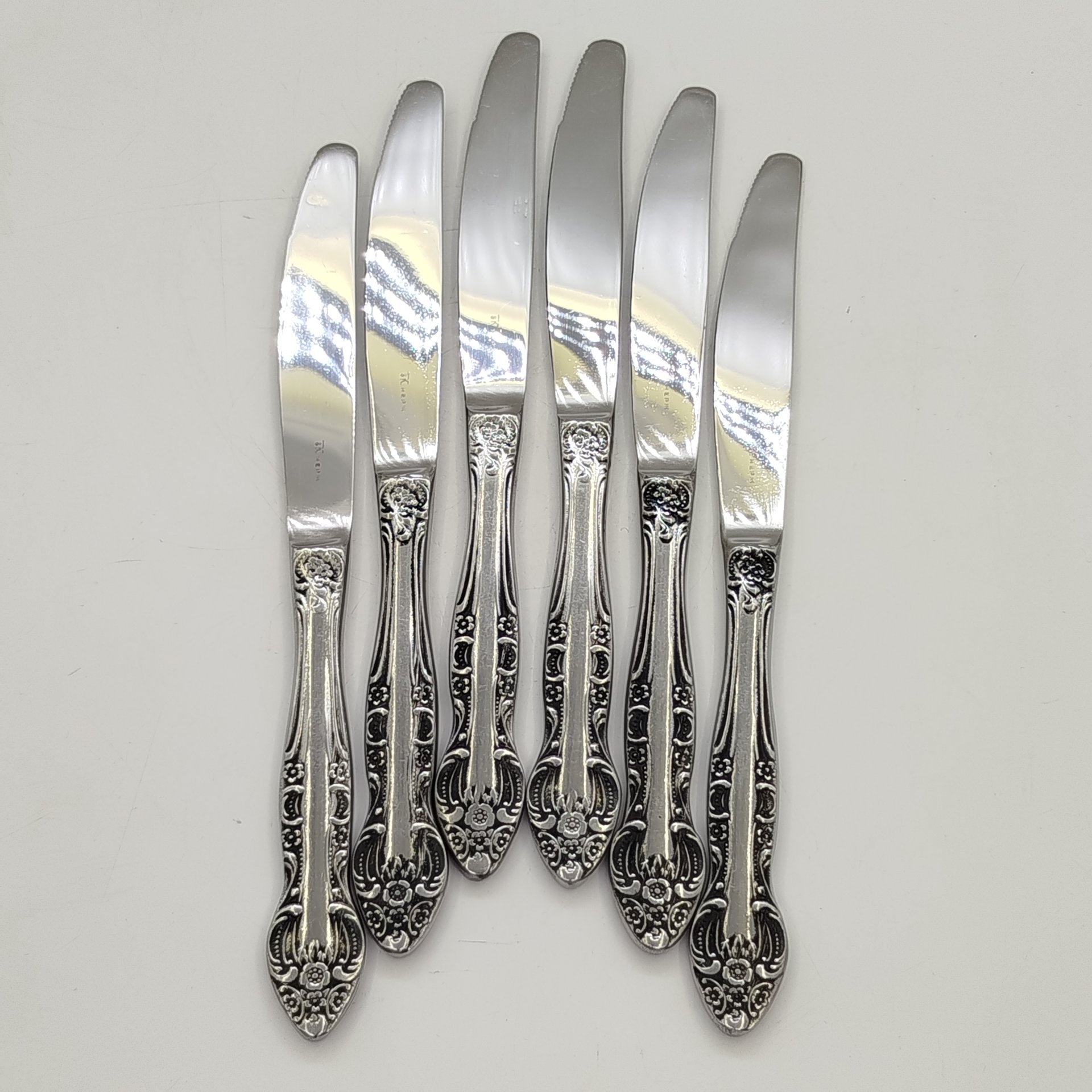 Набор ножей на 6 персон с цветочным декором на черенках, нержавеющая сталь, Кировский завод, СССР, 1970-1990 гг.