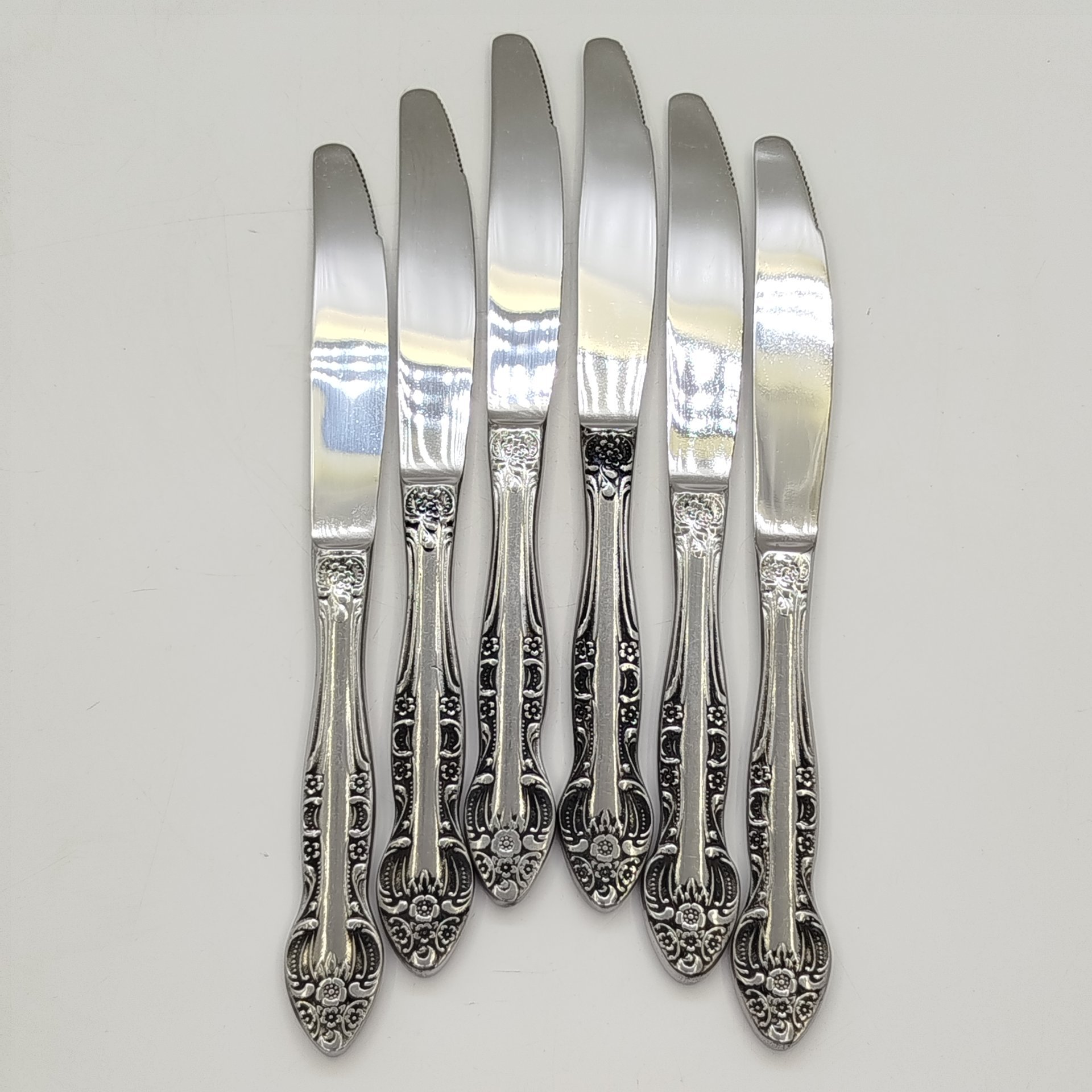 Набор ножей на 6 персон с цветочным декором на черенках, нержавеющая сталь, Кировский завод, СССР, 1970-1990 гг.