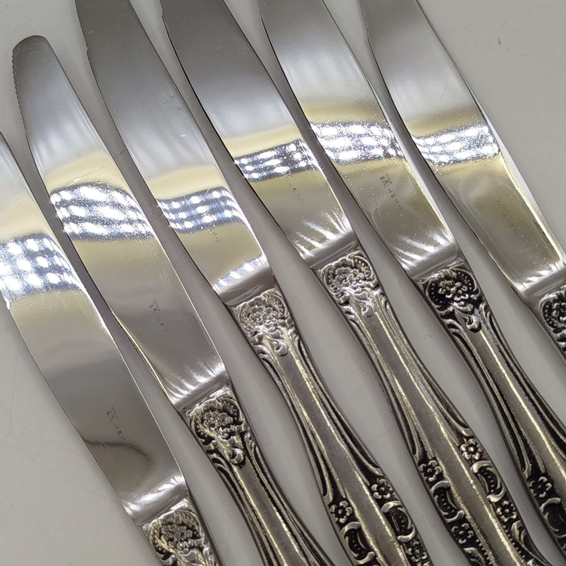 Набор ножей на 6 персон с цветочным декором на черенках, нержавеющая сталь, Кировский завод, СССР, 1970-1990 гг.