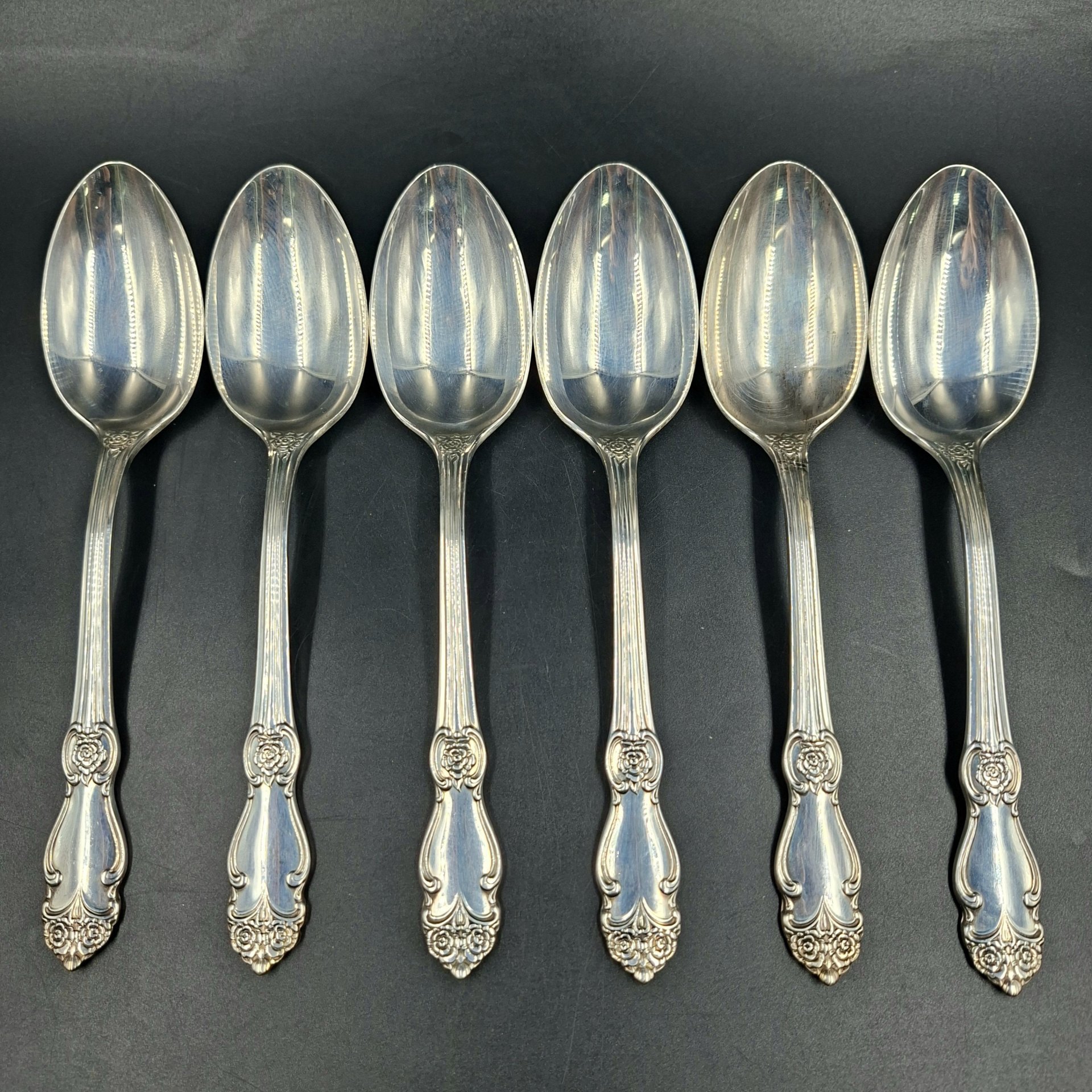 Набор из шести обеденных ложек "Серебряная роза", мНЦ (медь-никель-цинк), Кольчугинский завод цветных металлов, СССР, 1970-1990 гг.