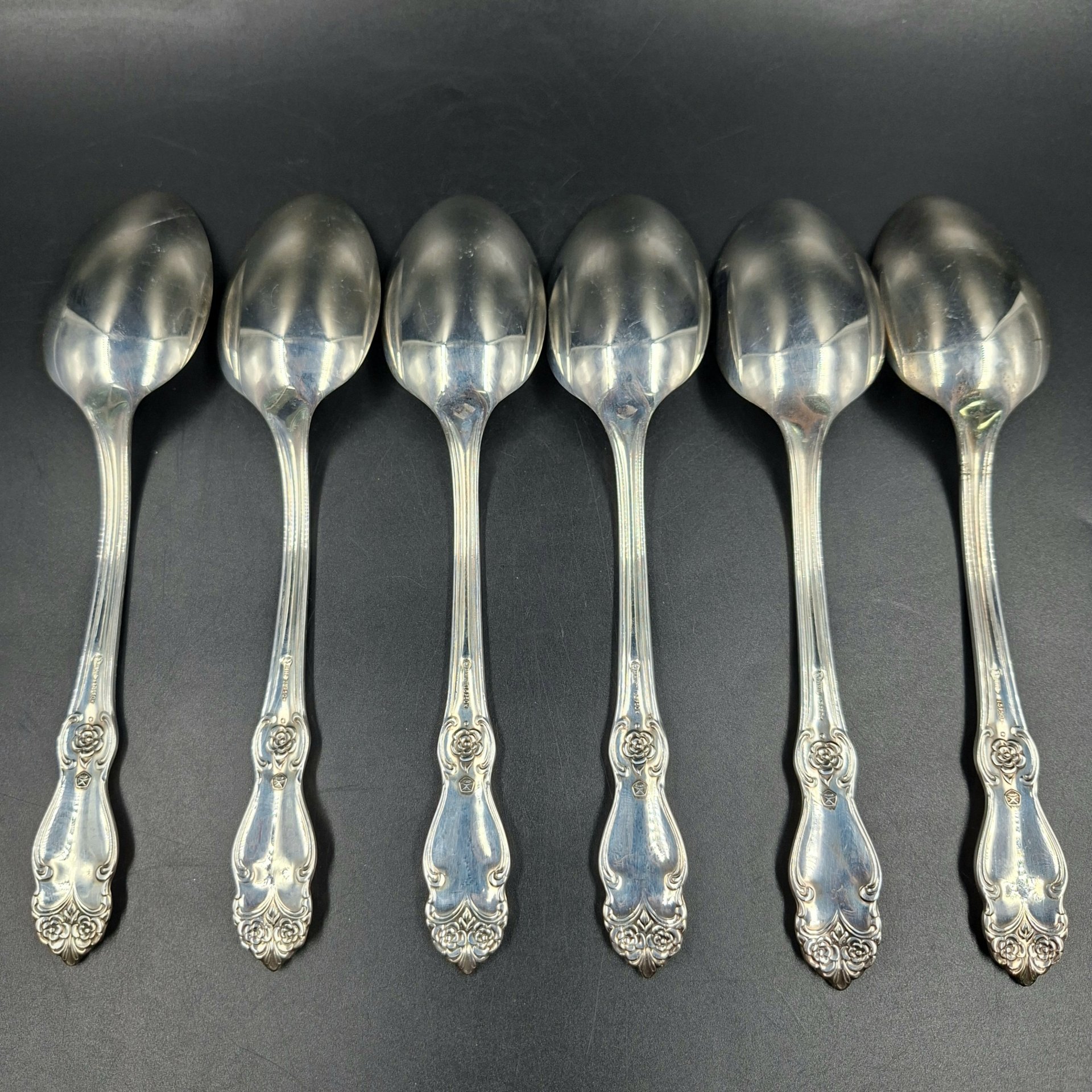 Набор из шести обеденных ложек "Серебряная роза", мНЦ (медь-никель-цинк), Кольчугинский завод цветных металлов, СССР, 1970-1990 гг.