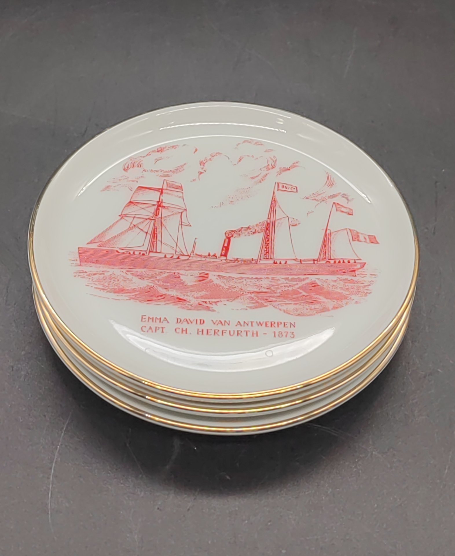 Розетки (подставки для стаканов), украшенные изображением корабля "Emma David Van Antwerpen. Capt. Ch. Herfurth - 1873", на 3 персоны, фарфор, деколь, золочение, Fürstenberg, Германия, 1966-1990 гг., Fürstenberg