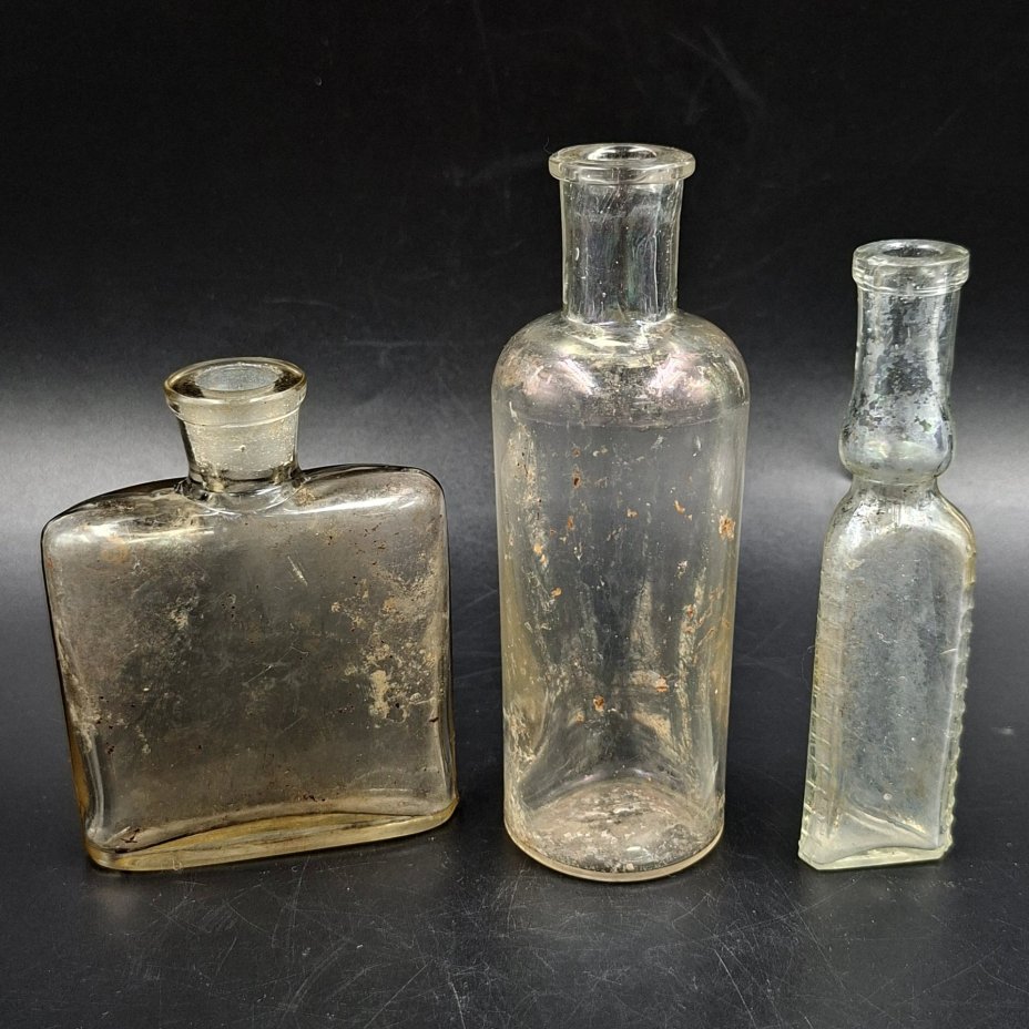Набор из трех бесцветных флаконов различных форм, стекло, Россия, 1900-1940 гг.