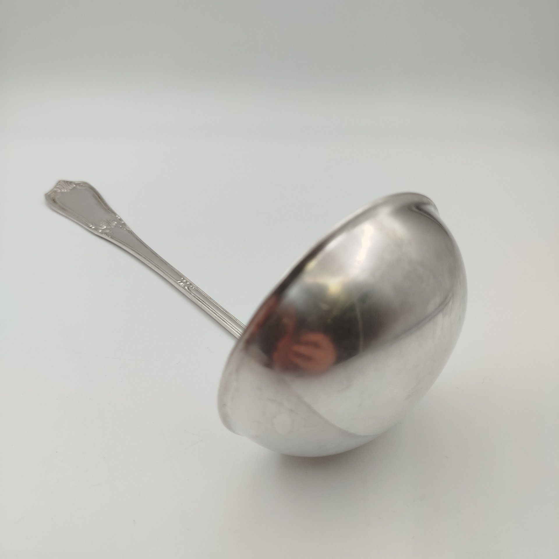 Половник с растительным декором