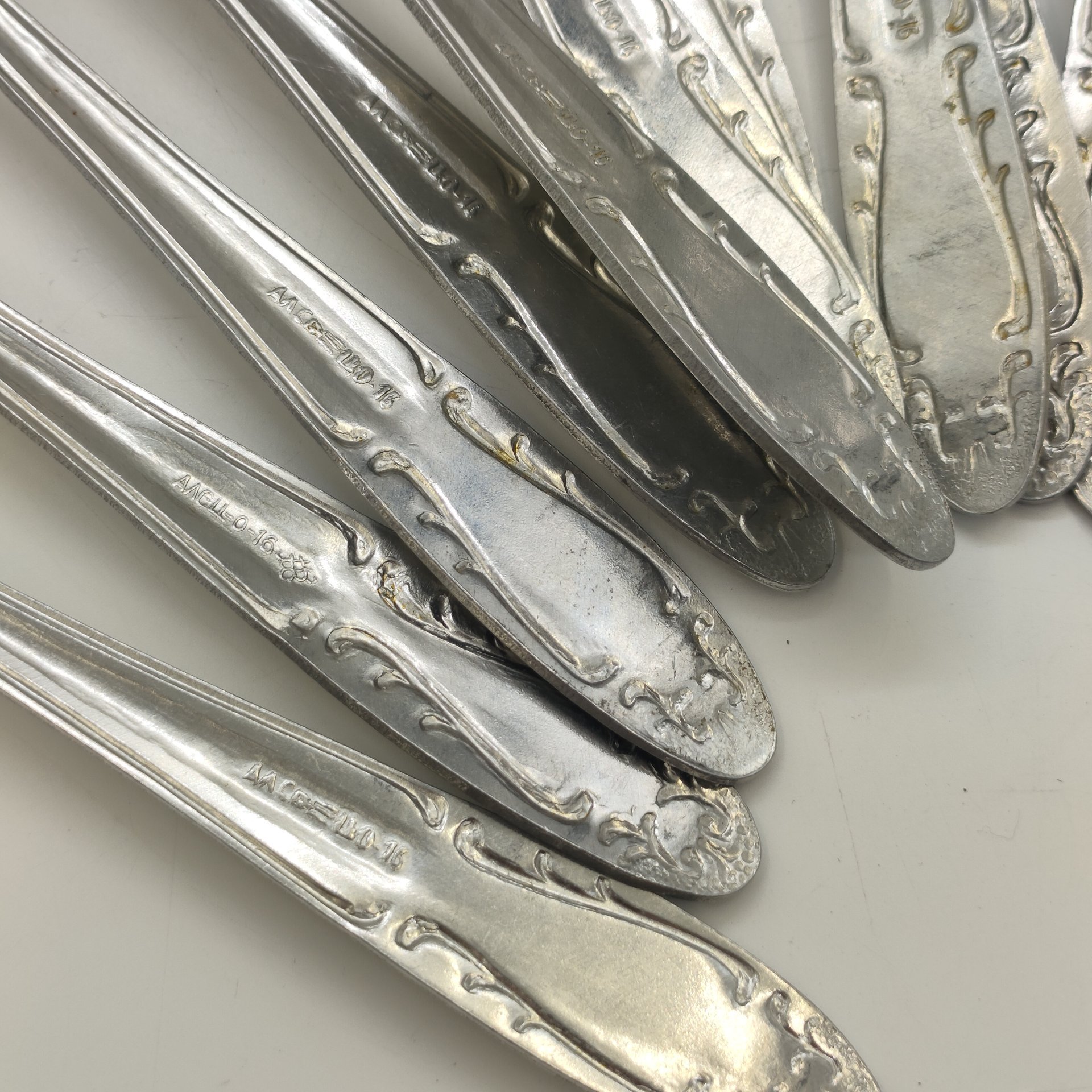 Набор из 13-ти столовых ложек с растительным декором, Производственное объединение "Мосметаллопосуда", алюминий, СССР, 1972-1982 гг.