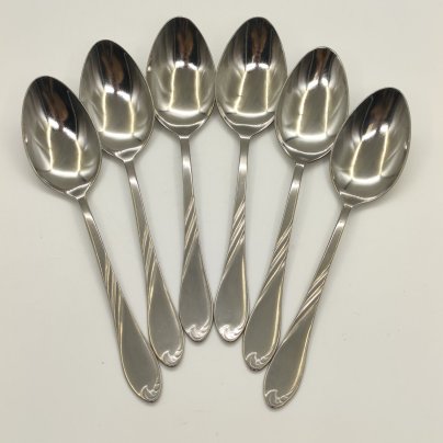 Набор из 6-ти столовых ложек, украшенных растительным декором, нержавеющая сталь, Павловский завод художественных металлоизделий им. С.М. Кирова, СССР, 1973-1991 гг.