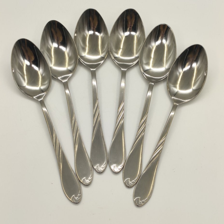 Набор из 6-ти столовых ложек, украшенных растительным декором, нержавеющая сталь, Павловский завод художественных металлоизделий им. С.М. Кирова, СССР, 1973-1991 гг.