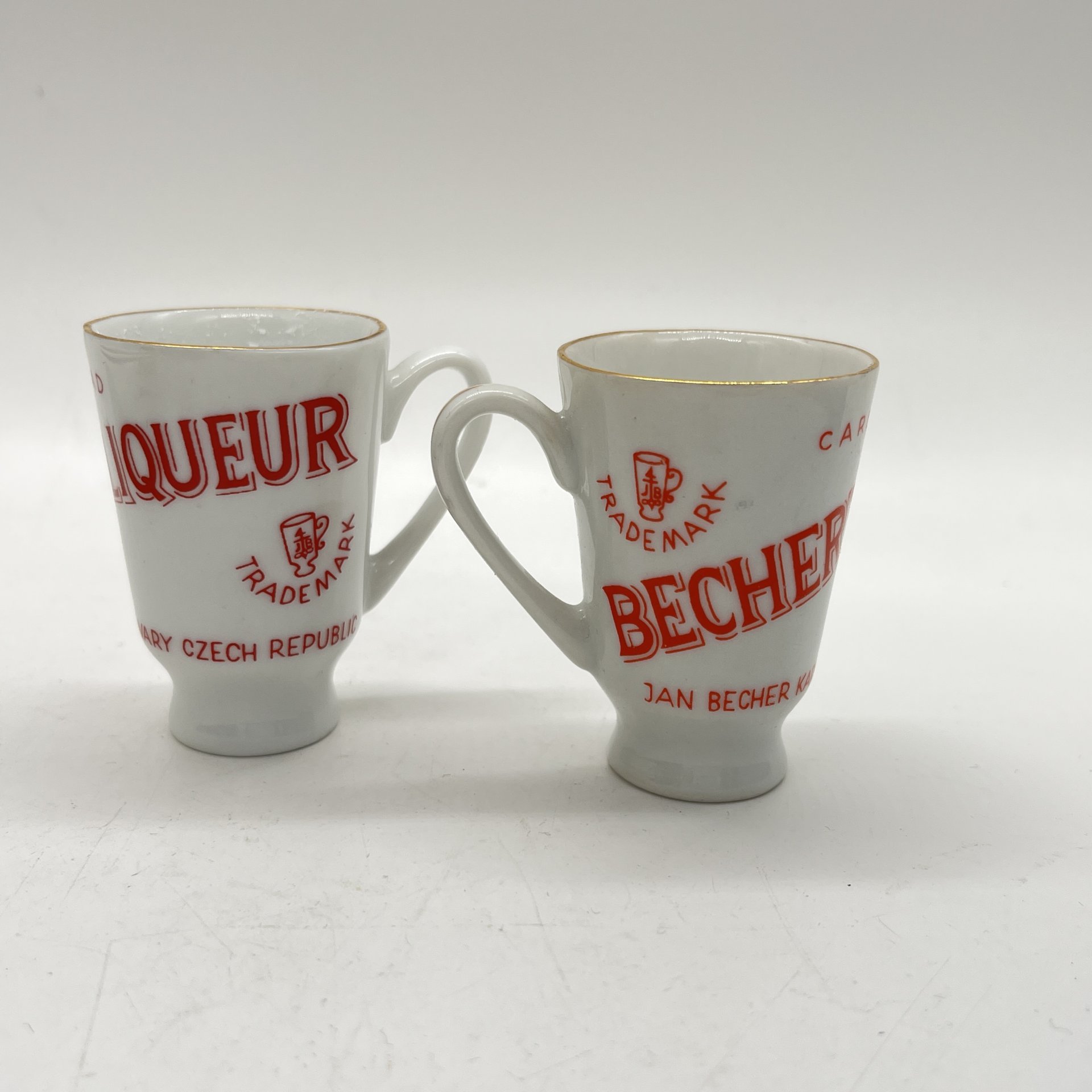 Набор из 2 ликерных рюмок с ручками "Becher's Liqueur", фарфор, деколь, золочение, Carlsbad, Чехословакия, 1970-1990 гг.