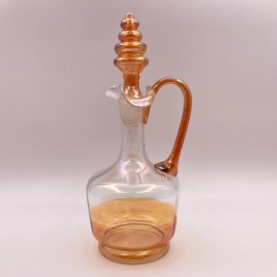 Штоф оранжевого цвета с фигурной пробкой в виде пирамидки, стекло, гутная техника, люстр
