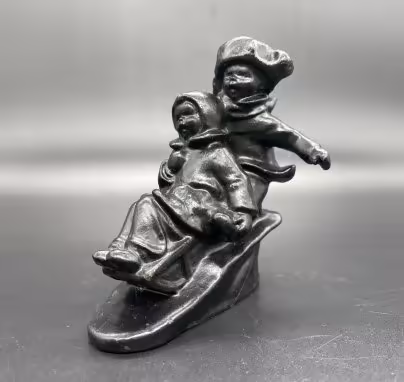Статуэтка "Дети на санках", автор модели Ю.П. Косарев, Каслинский чугунолитейный завод (Касли)