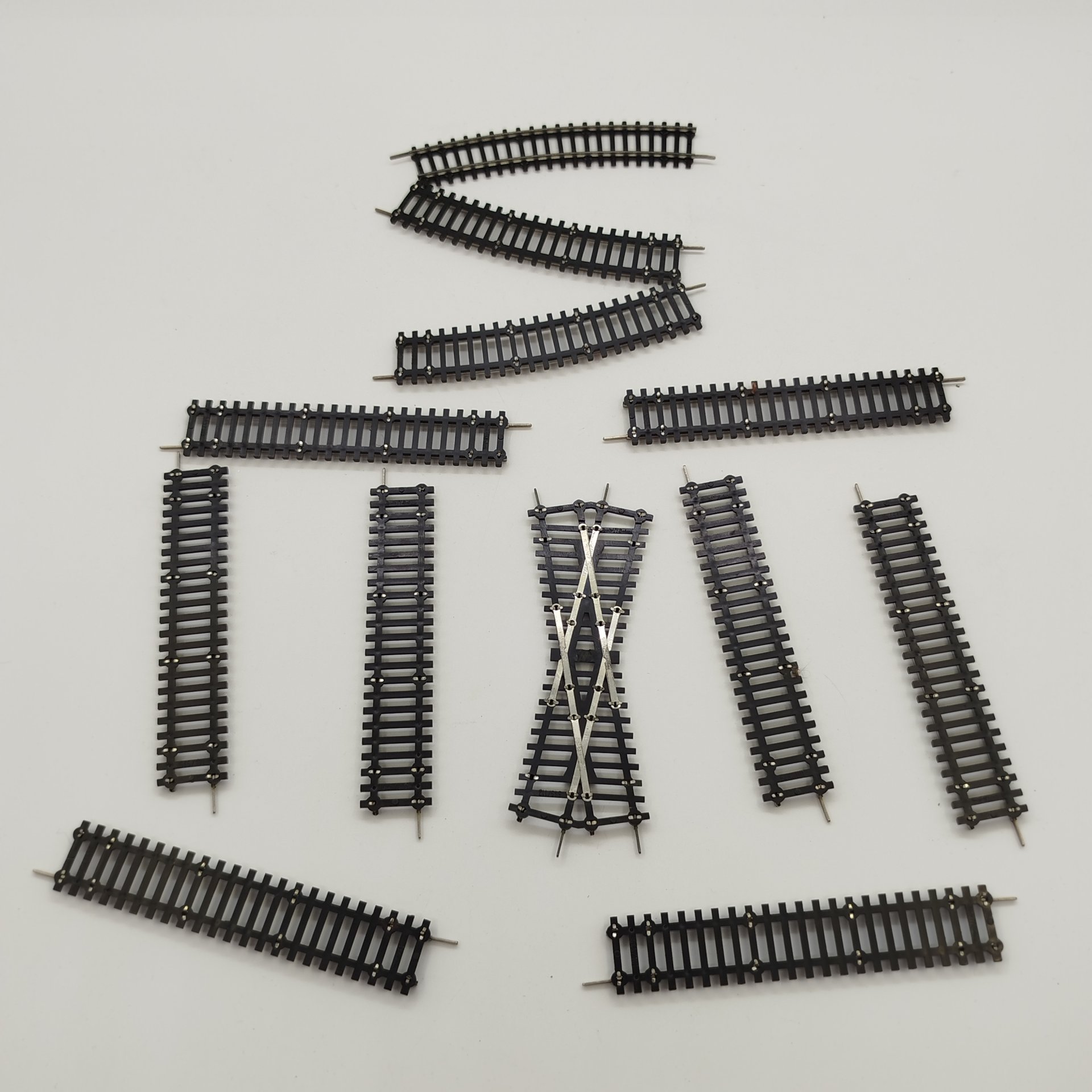 Набор из двенадцати рельс для железной дороги 9 мм., пластик, металл, Piko, ГДР, 1970-1980 гг.