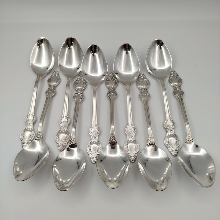 Нет фото.Набор из 10-ти столовых ложек, украшенных растительным декором