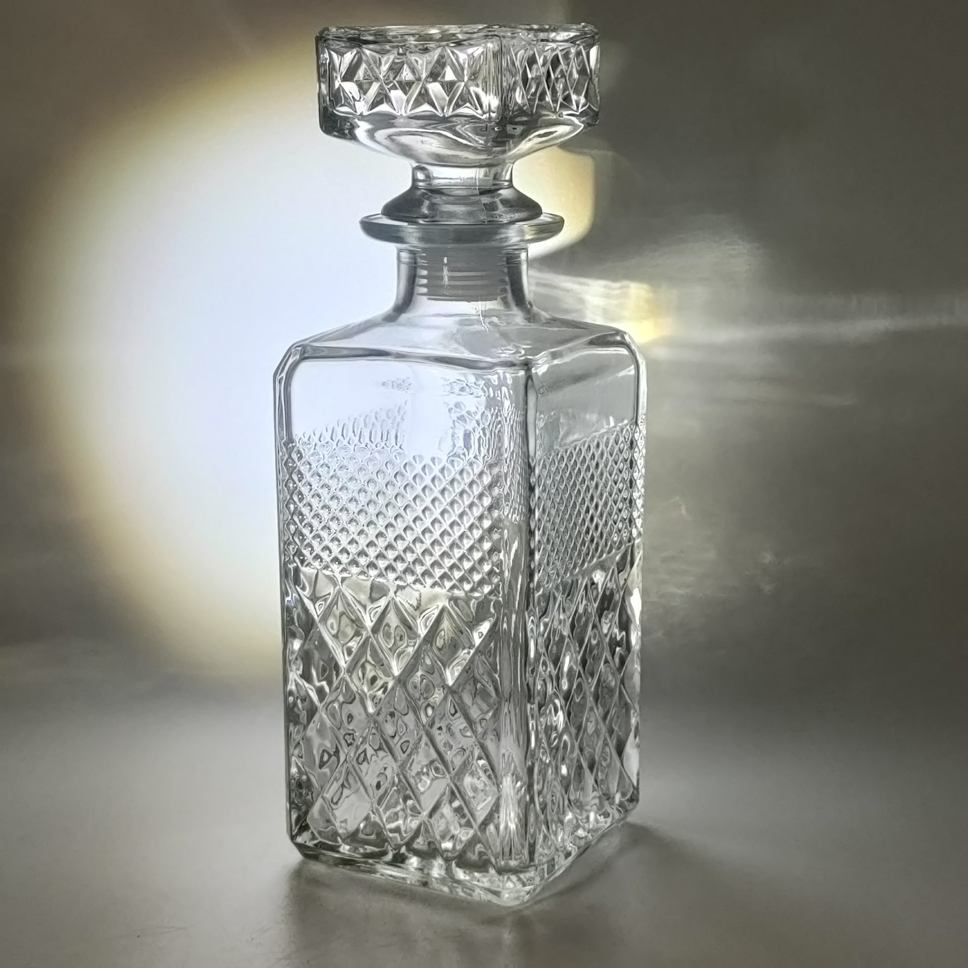 Графин (штоф) четырехугольной формы с рельефным геометрическим декором, стекло, СССР, 1970-1990 гг.