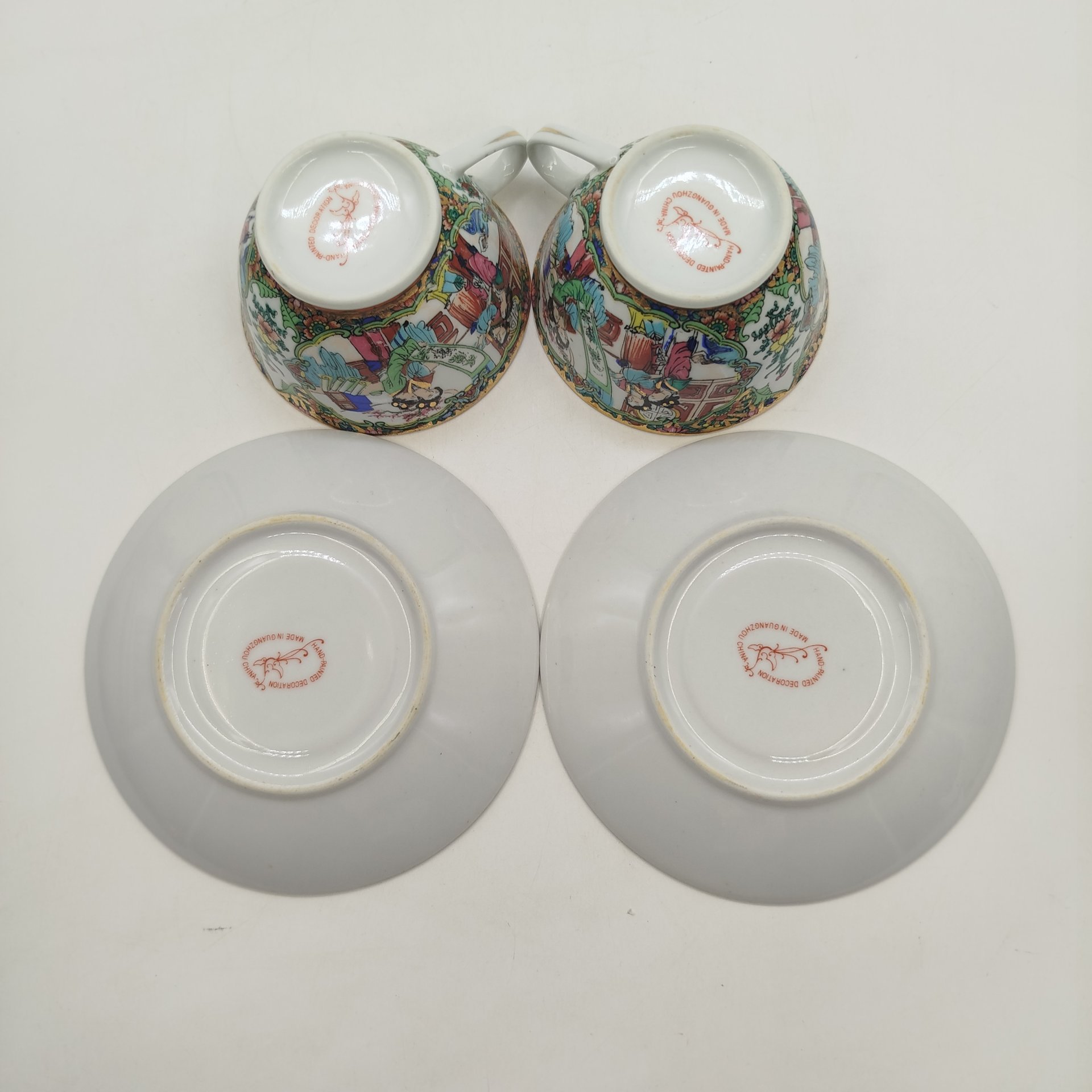 Набор из двух чайных пар украшенных сюжетом в восточном стиле, Guangzhou, фарфор, деколь с подрисовкой, золочение, Китай, 1970-1990 гг.