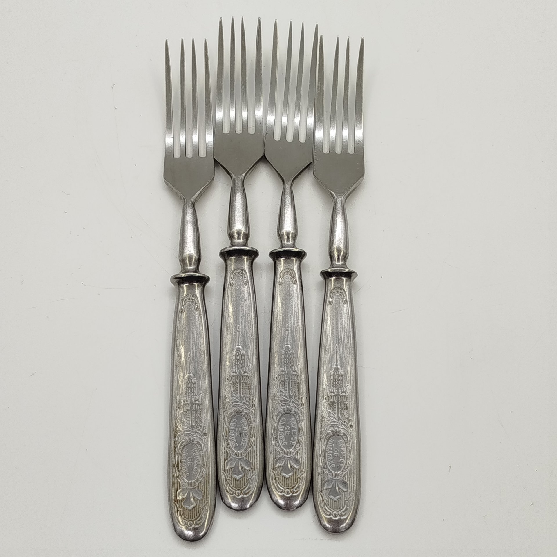 Набор из 4-х столовых вилок с фигурным изображением на ручке, нержавеющая сталь, Павловский завод художественных металлоизделий им. С.М. Кирова