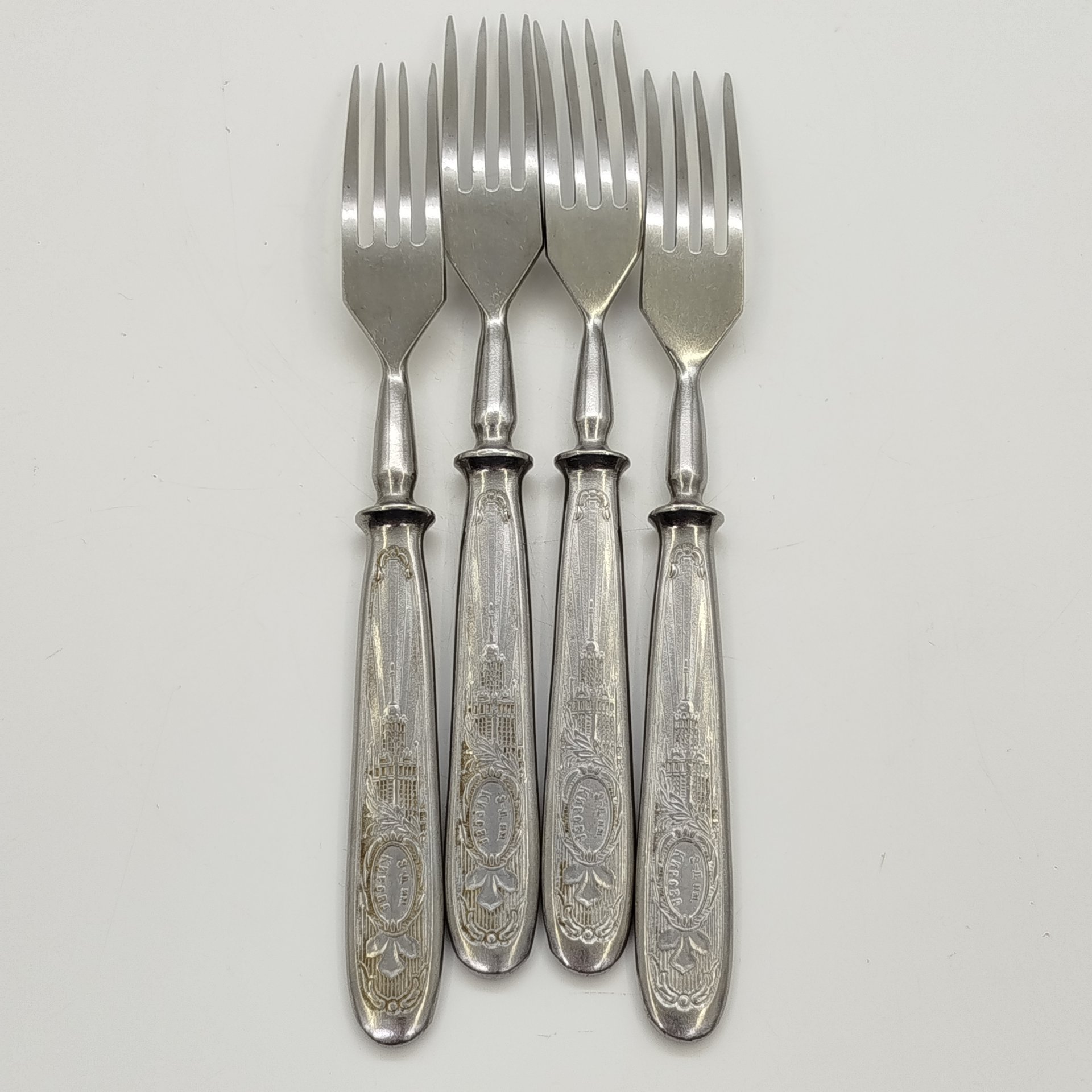 Набор из 4-х столовых вилок с фигурным изображением на ручке, нержавеющая сталь, Павловский завод художественных металлоизделий им. С.М. Кирова