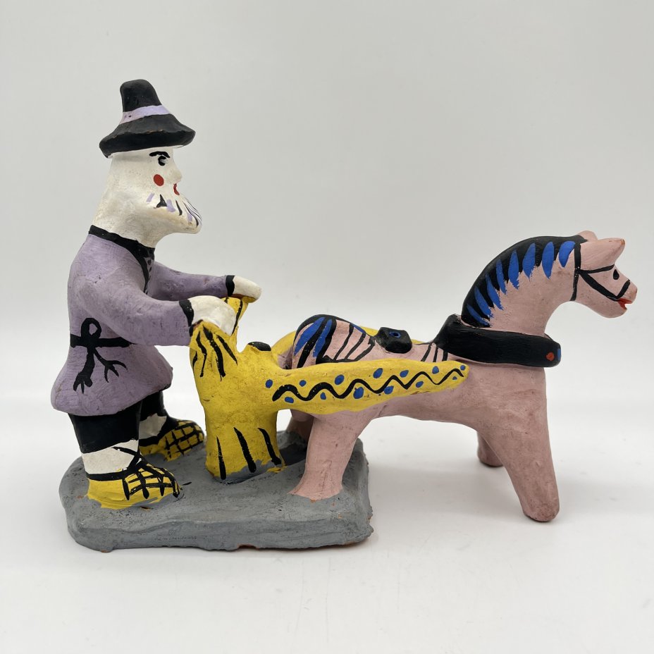 Игрушка каргопольская "За плугом" ("Пахарь")