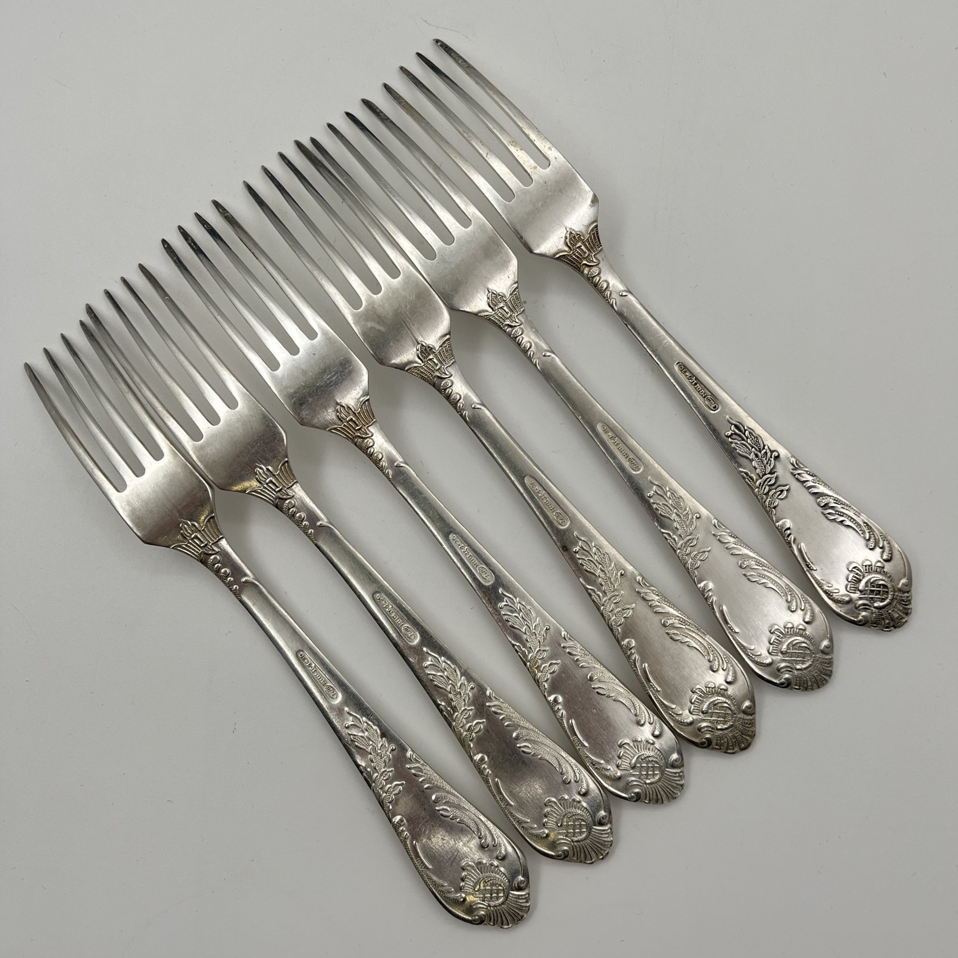 Набор из шести десертных вилок с растительным декором, мНЦ (медь-никель-цинк), картон, Вольнянский завод столовых приборов им. Шевченко (ЗiШ, ЗиШ), СССР, 1960-1990 гг.