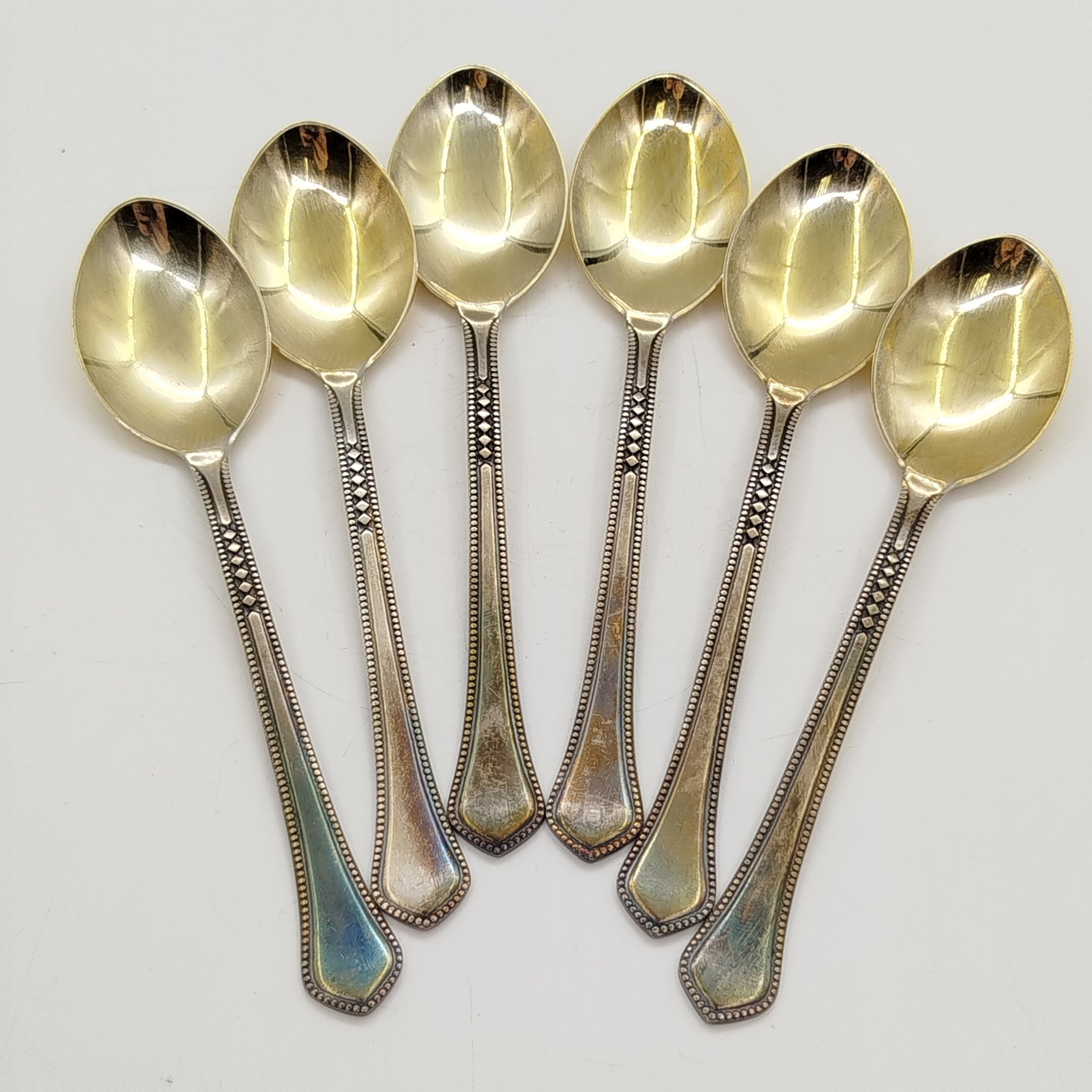 Набор из 6-ти чайных ложек, украшенных геометрическим декором, мНЦ (медь-никель-цинк), Таллинский ювелирный завод, СССР, 1970-1990 гг.