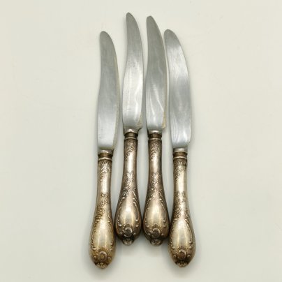 Набор из 4-х десертных ножей с растительным декором, мНЦ (медь-никель-цинк), нержавеющая сталь, Вольнянский завод столовых приборов им. Шевченко (ЗiШ, ЗиШ), СССР, 1960-1990 гг.