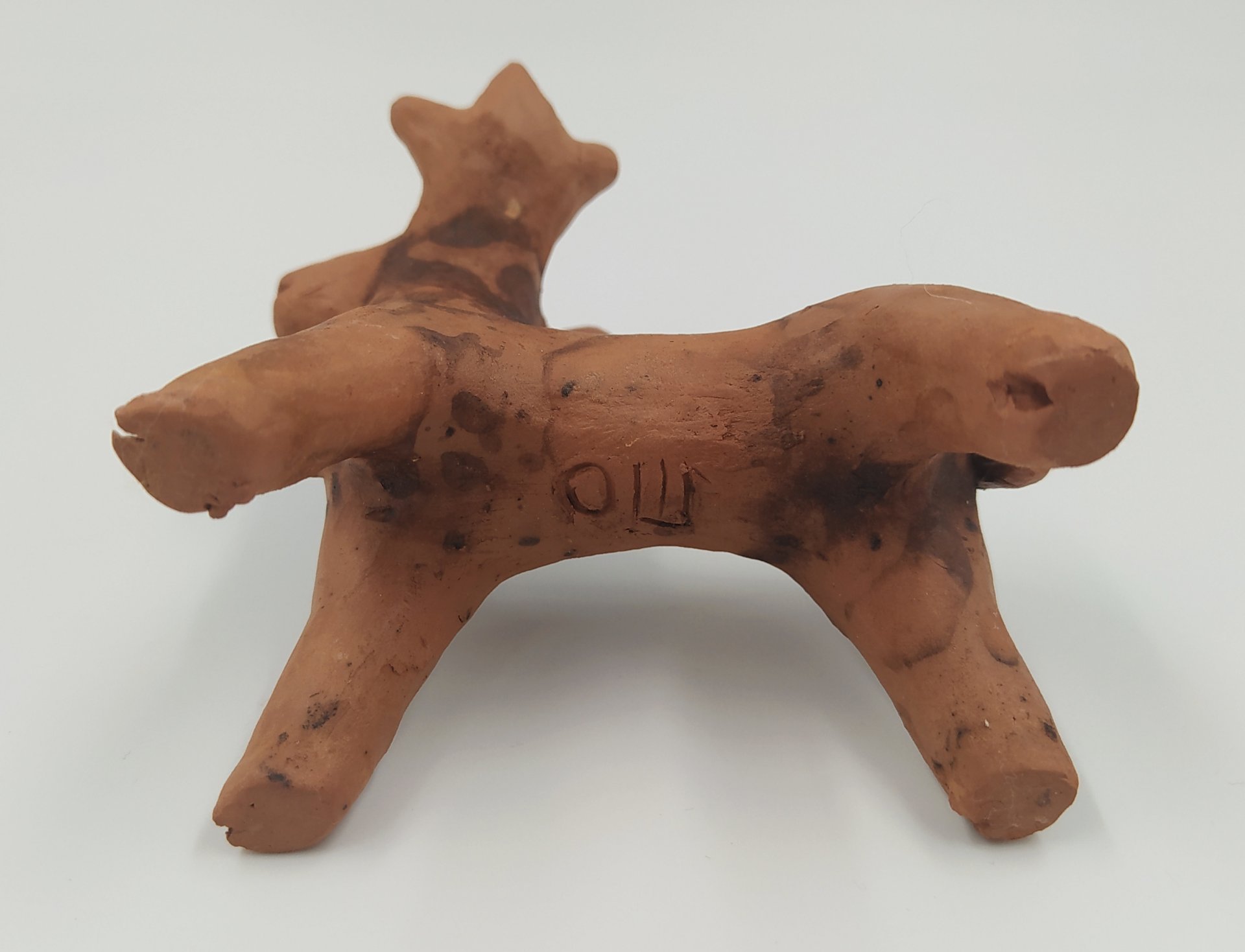 Игрушка каргопольская "Олень", подпись мастера "О.Ш."