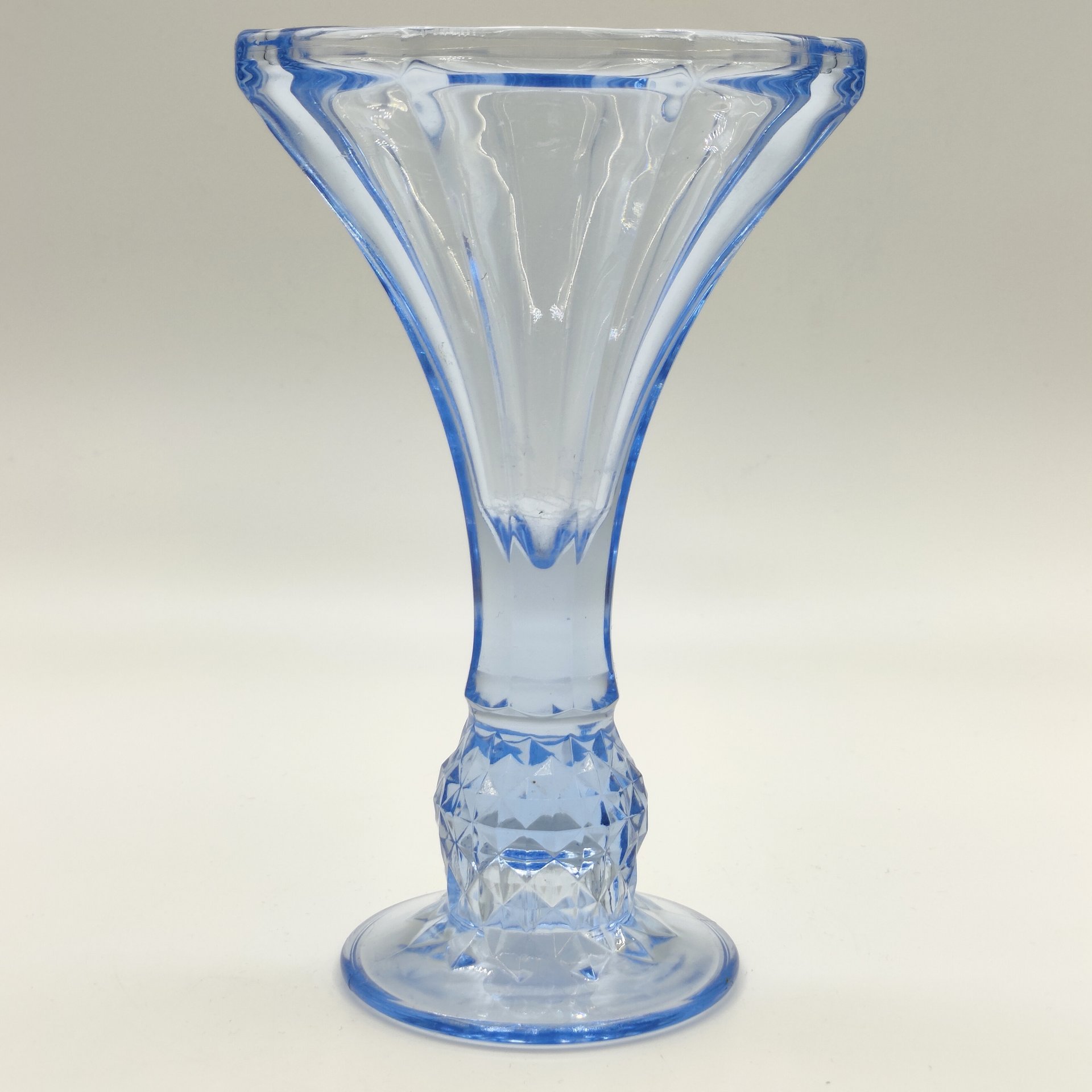 Ваза (подсвечник) синего оттенка на ножке с рельефным декором, цветное стекло, пресс, Восточная Европа, 1960-1980 гг.