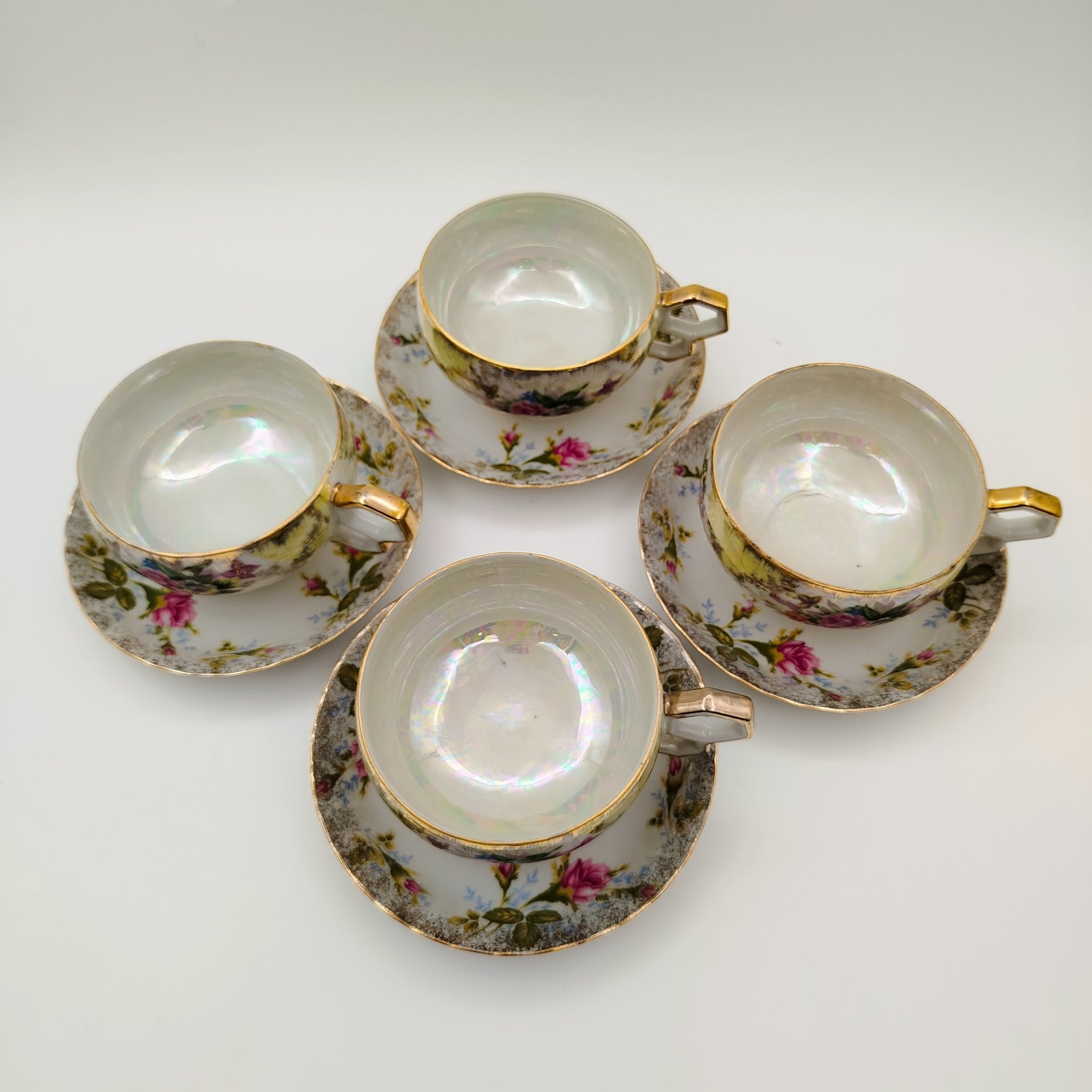 Набор чайных пар с цветочным декором на 4 персоны (в подборе), фарфор, люстр, деколь, золочение, Chodziez, Польша, 1970-1990 гг.