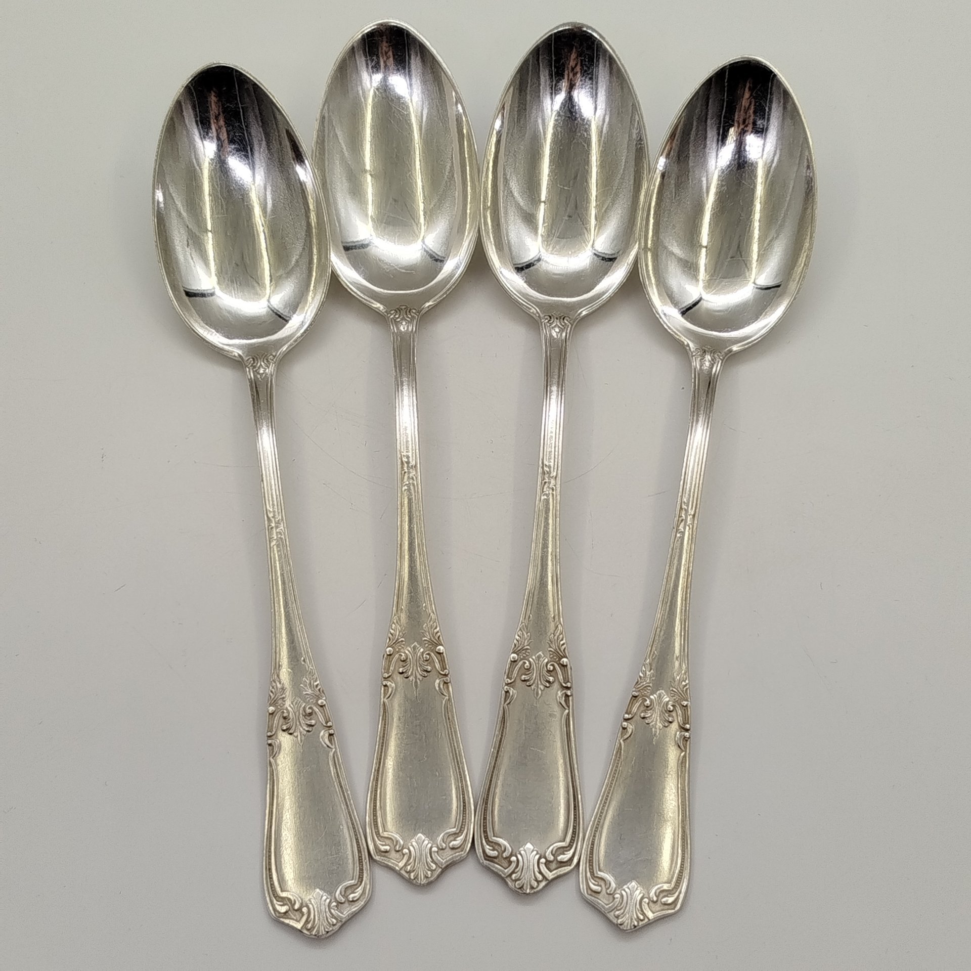 Набор из 4-х столовых ложек с растительным декором, мНЦ (медь-никель-цинк), Киевский завод столовых приборов и посуды им. Дзержинского (ЗiД, ЗиД), СССР, 1950-1960 гг.