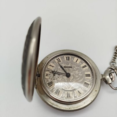 Часы карманные "Жар-птица", металл, бумага, печать, Челябинский часовой завод «Молния», СССР, 1980-1990 гг.